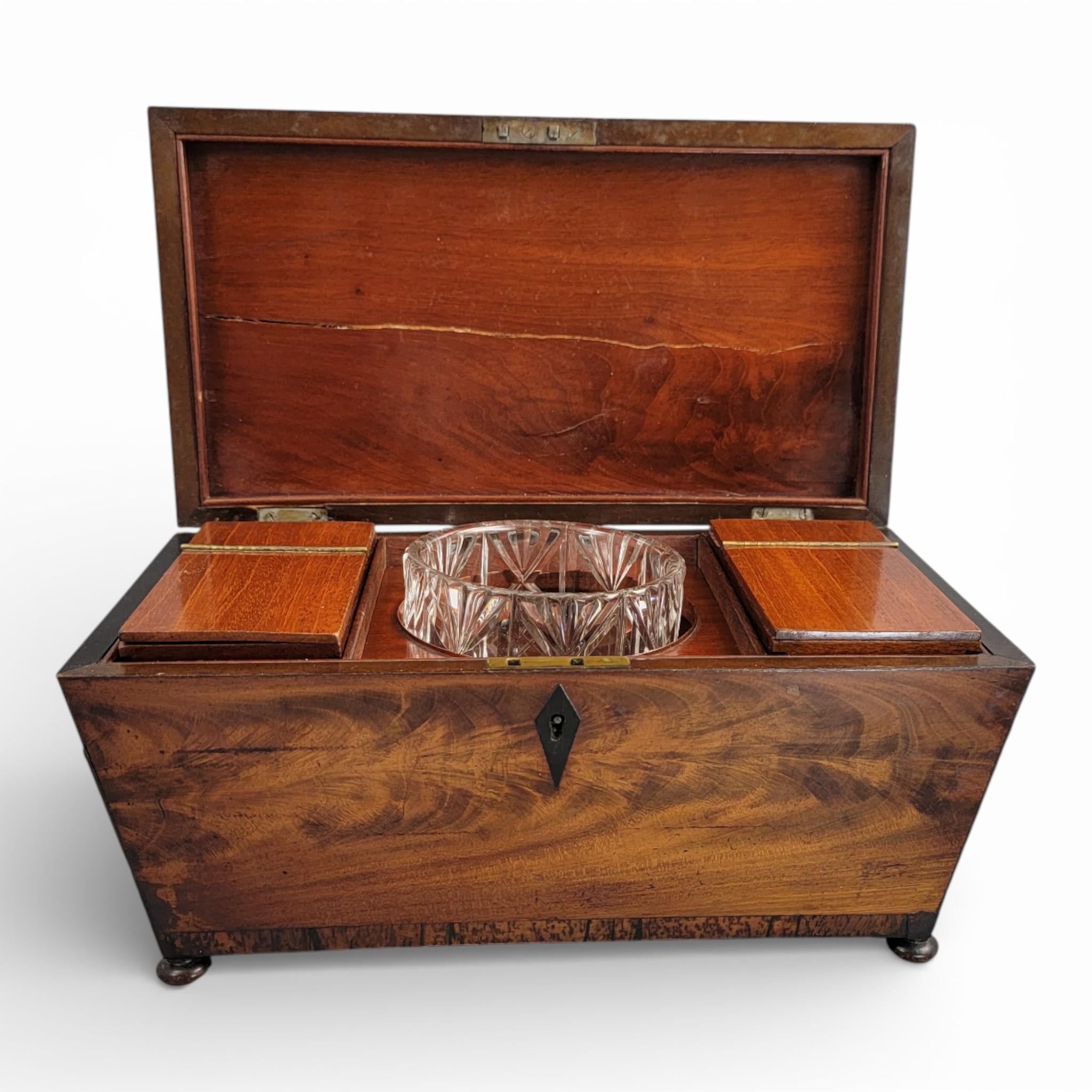 Antique English Regency mahogany tea caddy with cut glass bowl, c. 1820–1835