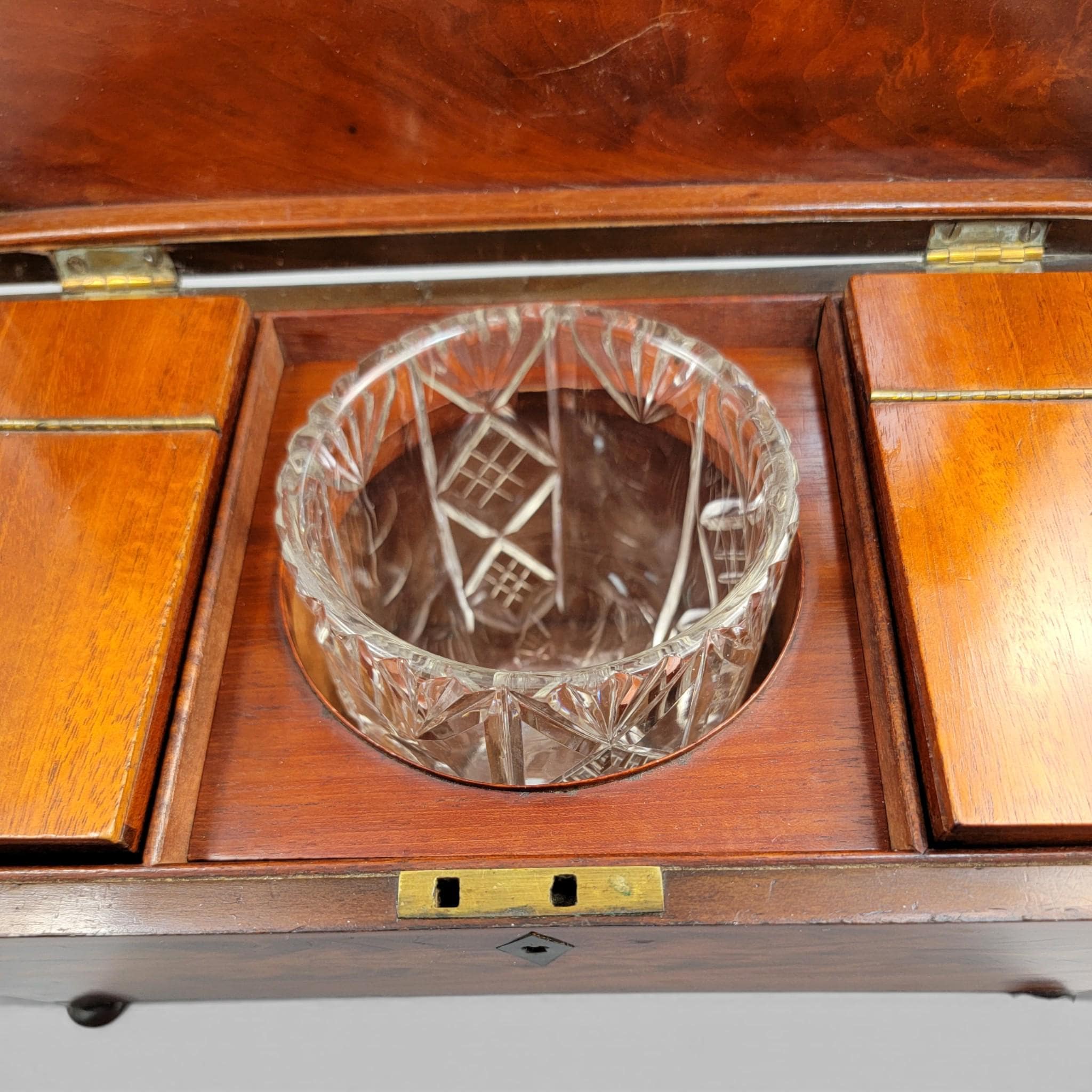 Antique English Regency mahogany tea caddy with cut glass bowl, c. 1820–1835