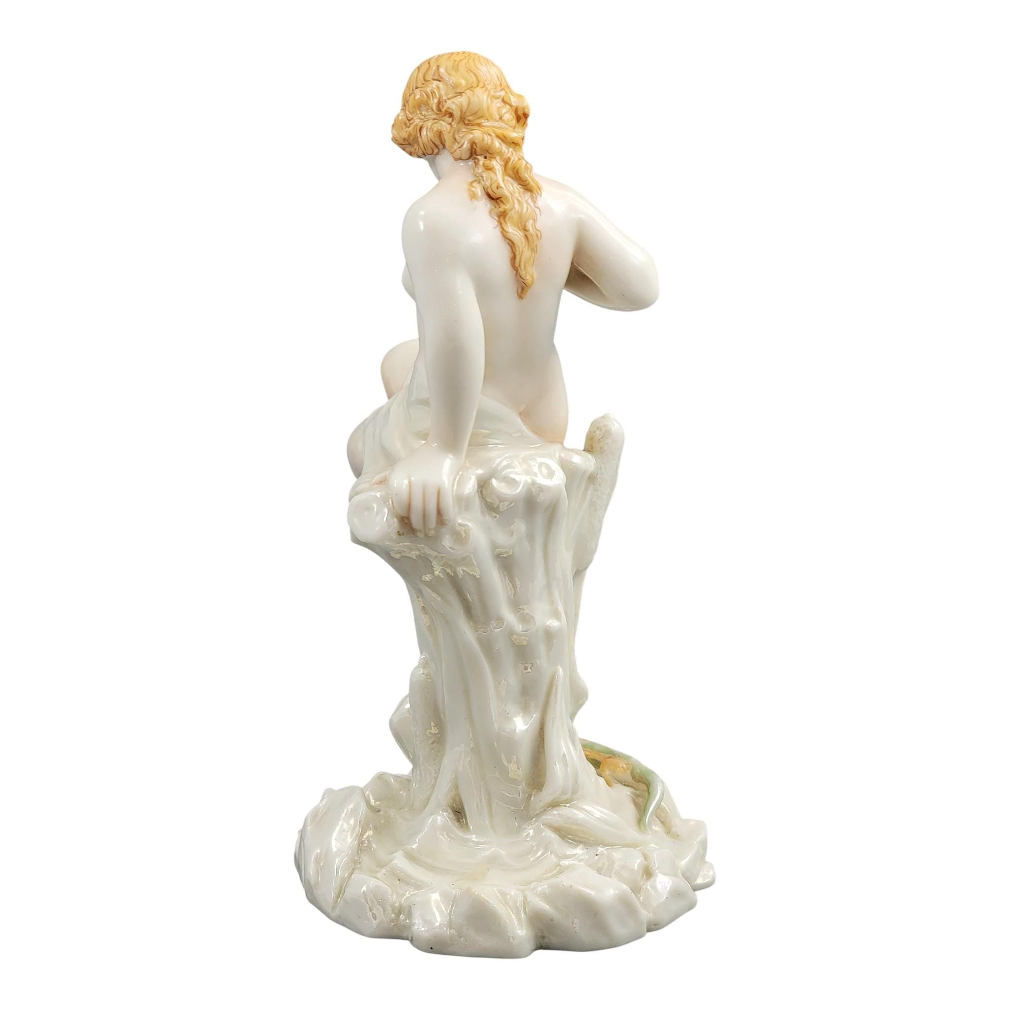 Royal Worcester iridescent porcelain maiden with lizard sculpture, c.1870
