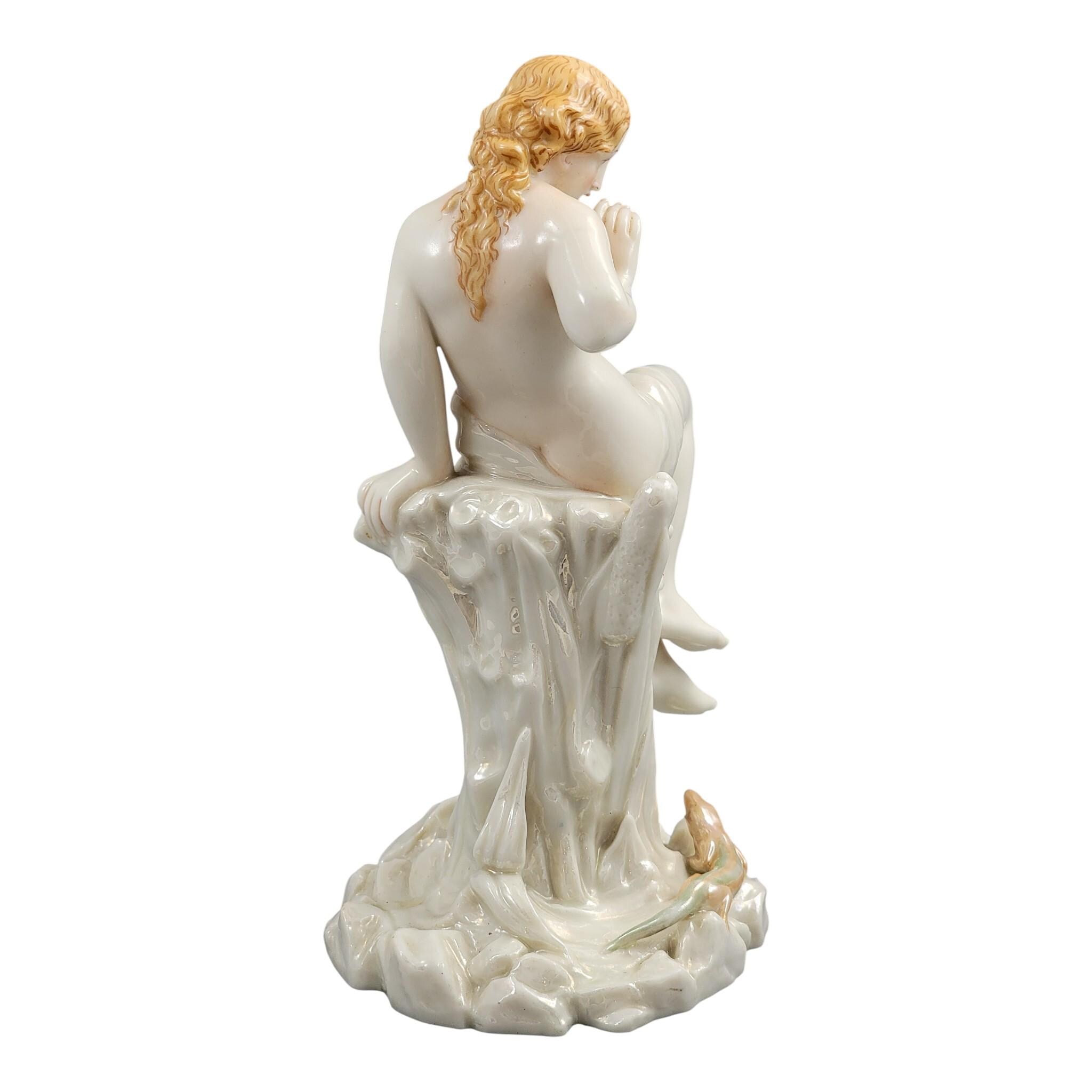 Royal Worcester iridescent porcelain maiden with lizard sculpture, c.1870