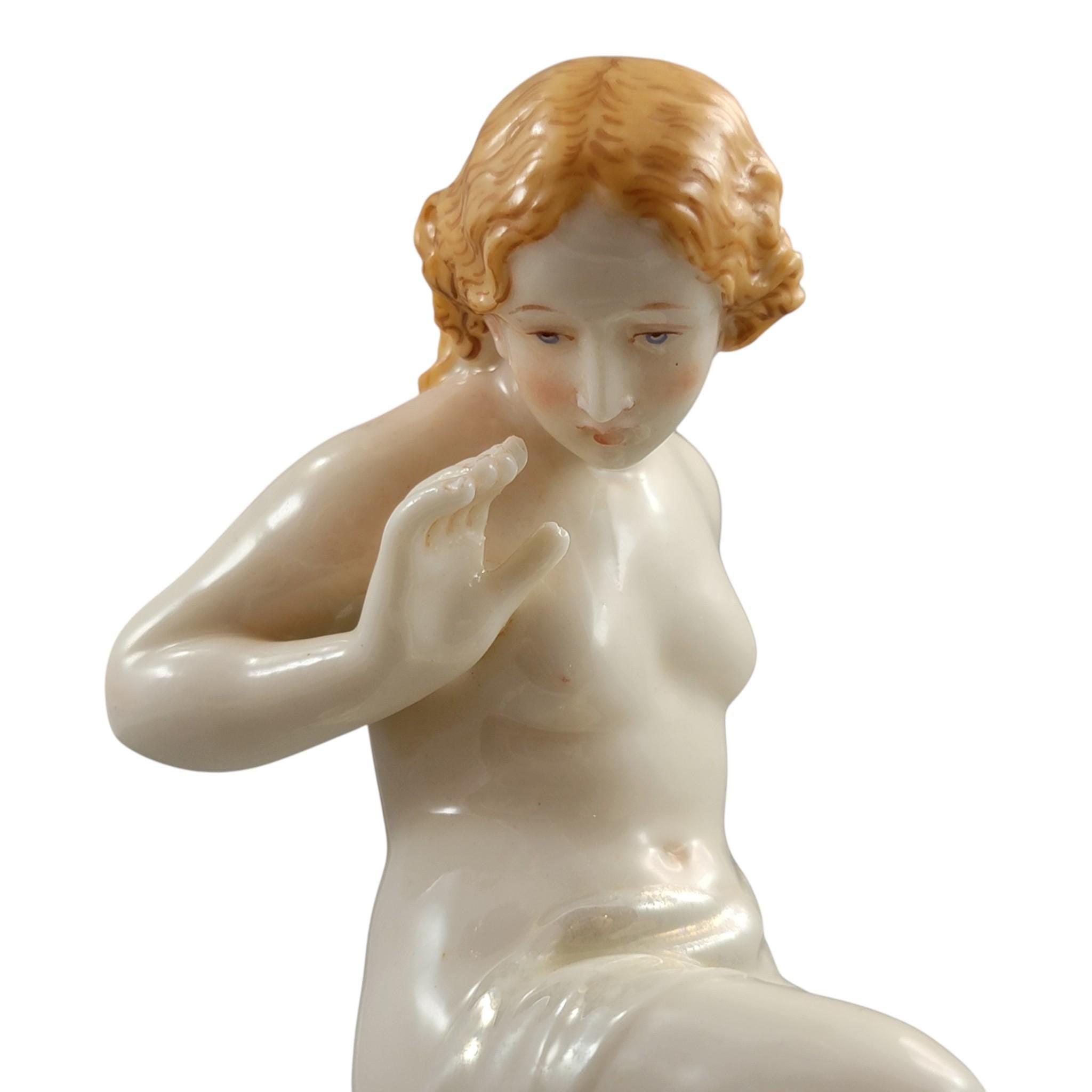Royal Worcester iridescent porcelain maiden with lizard sculpture, c.1870