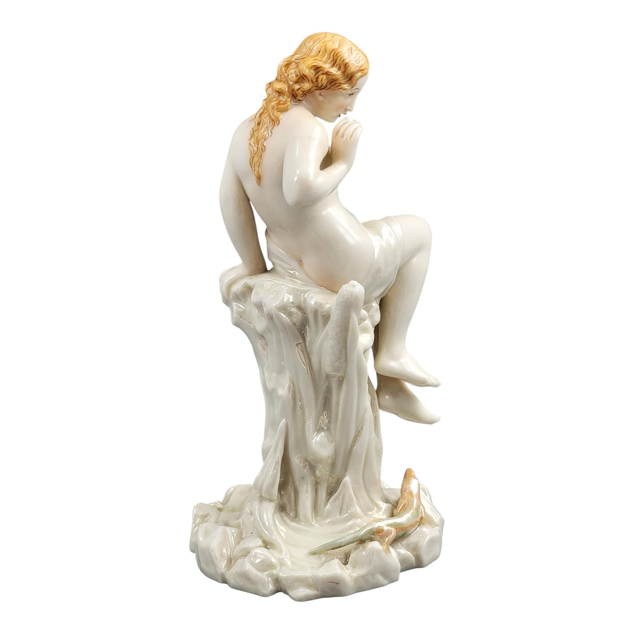 Royal Worcester iridescent porcelain maiden with lizard sculpture, c.1870