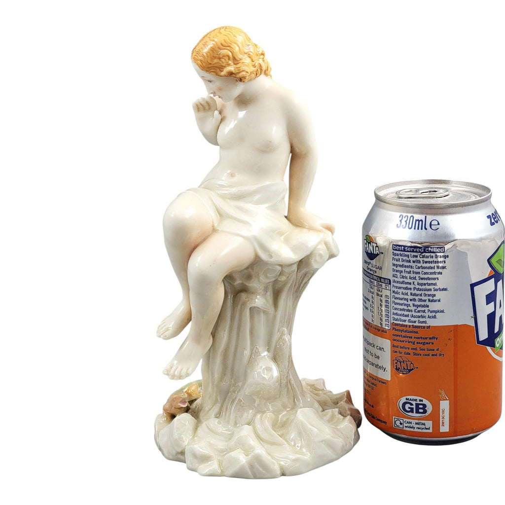 Royal Worcester iridescent porcelain maiden with lizard sculpture, c.1870