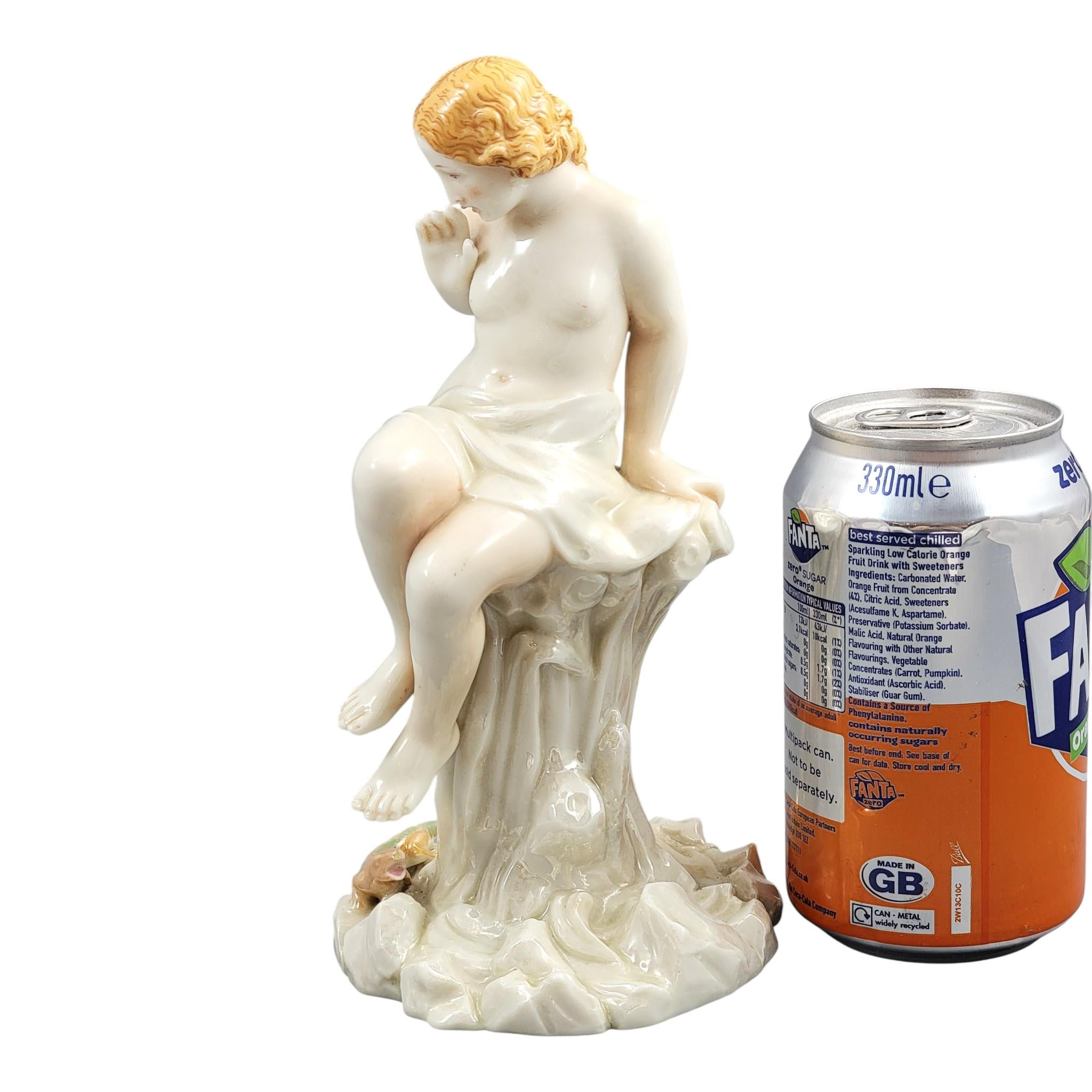 Royal Worcester iridescent porcelain maiden with lizard sculpture, c.1870
