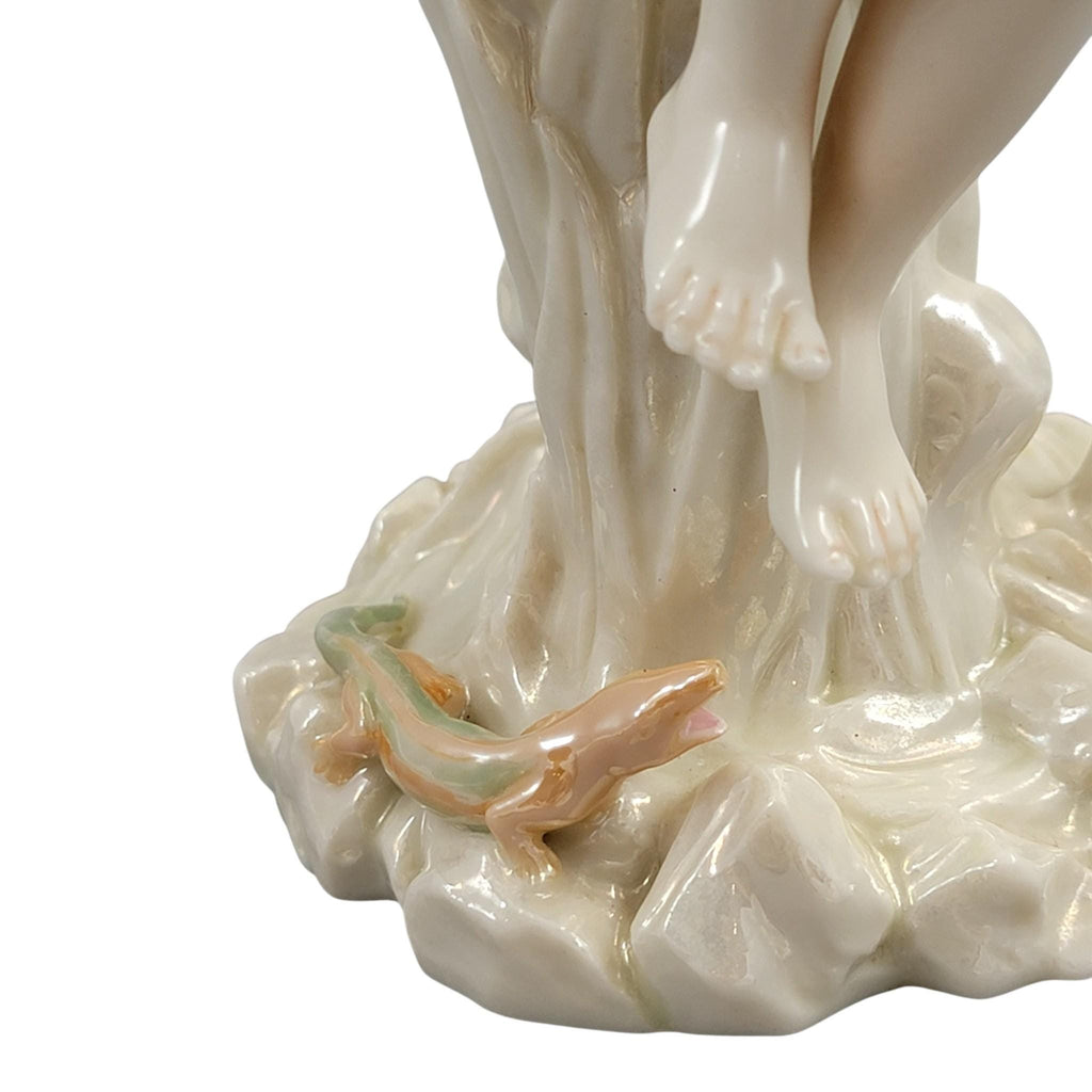 Royal Worcester iridescent porcelain maiden with lizard sculpture, c.1870