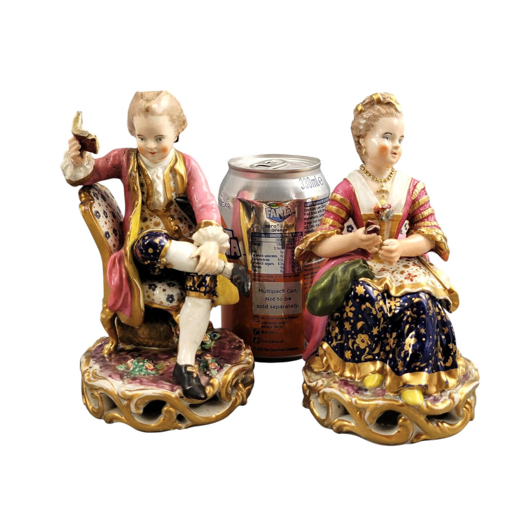 Derby Pair of Porcelain Figures “Boy Reading a Book and Girl Tatting”, c. 1785