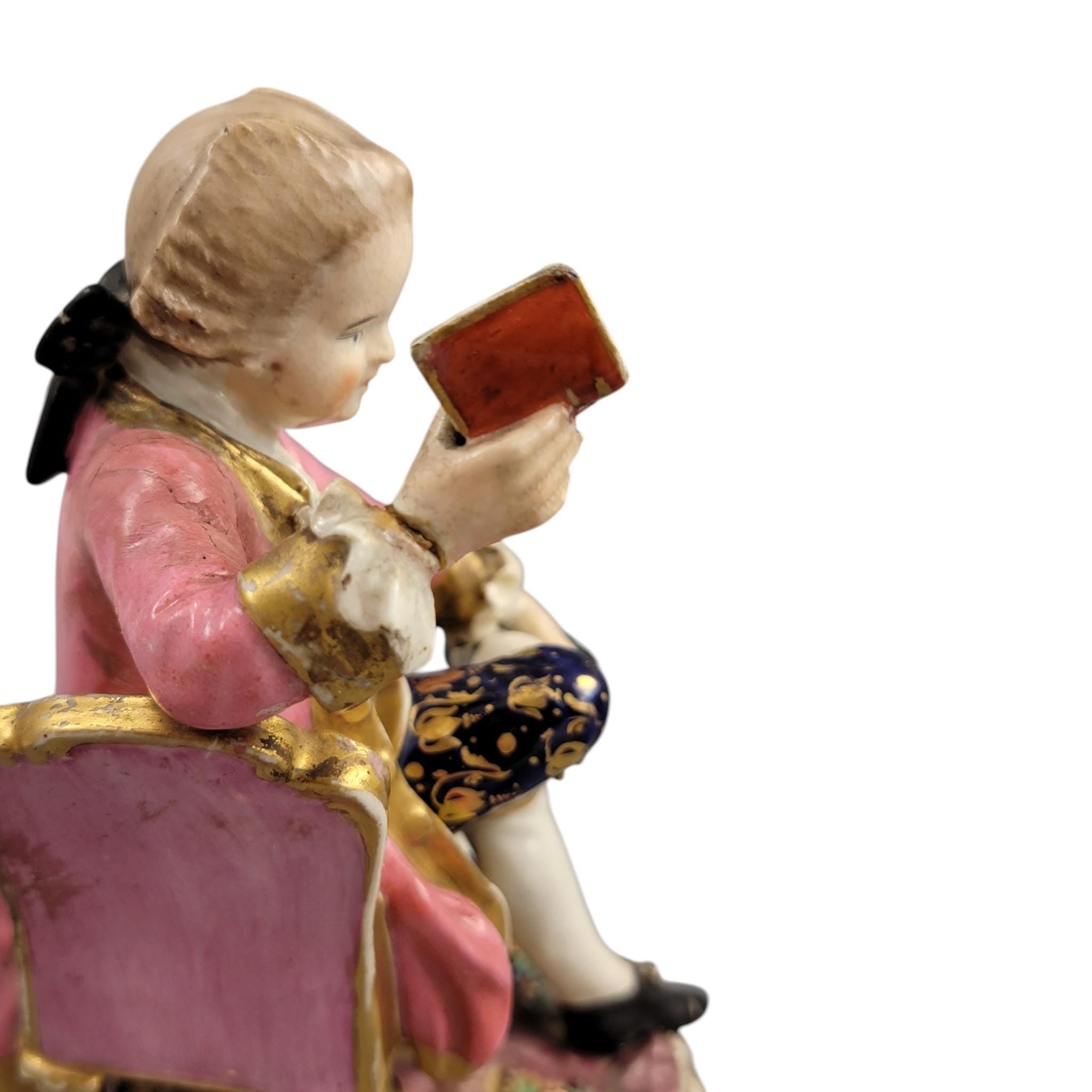 Derby Pair of Porcelain Figures “Boy Reading a Book and Girl Tatting”, c. 1785
