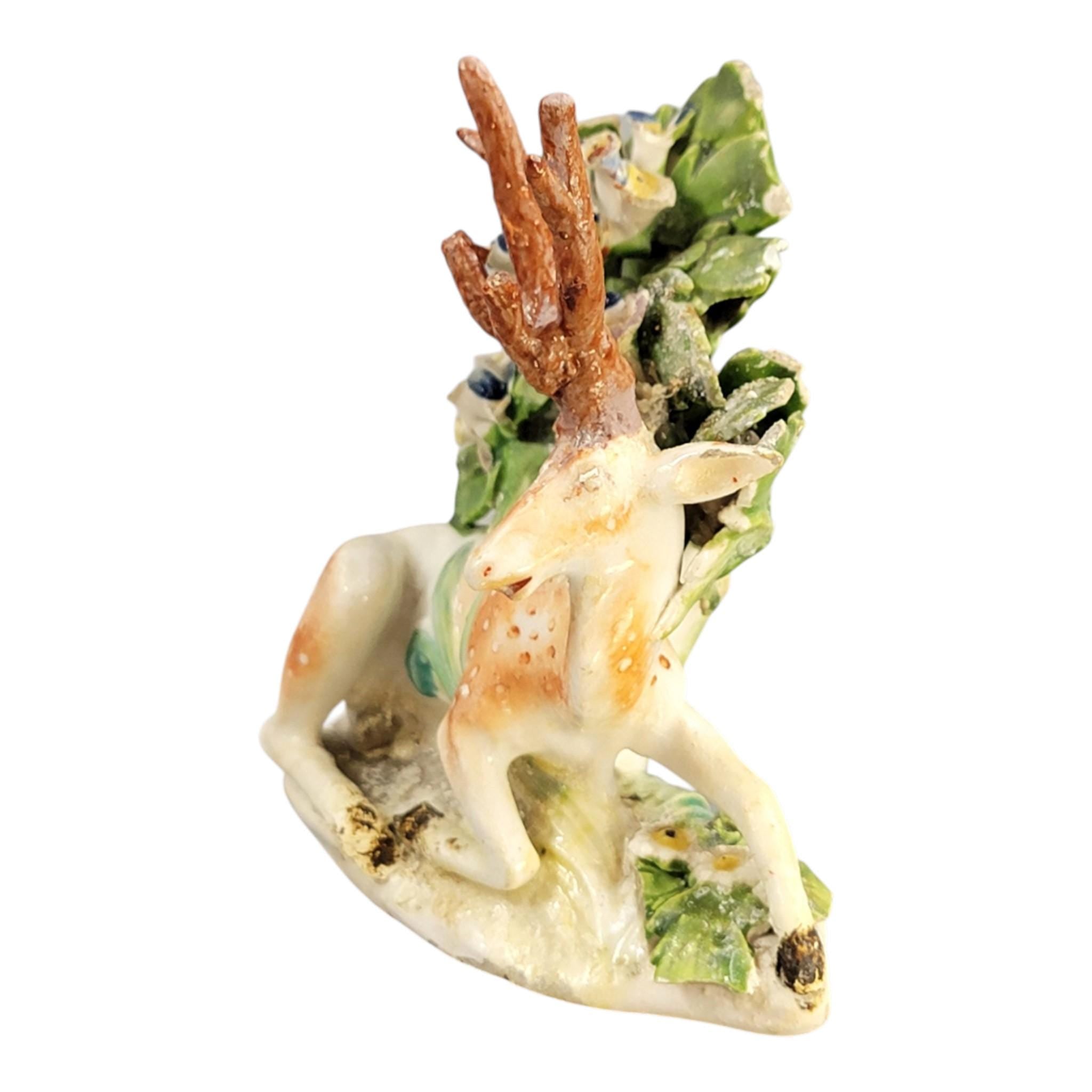 Early Derby porcelain recumbent stag figure Patch Period c.1760