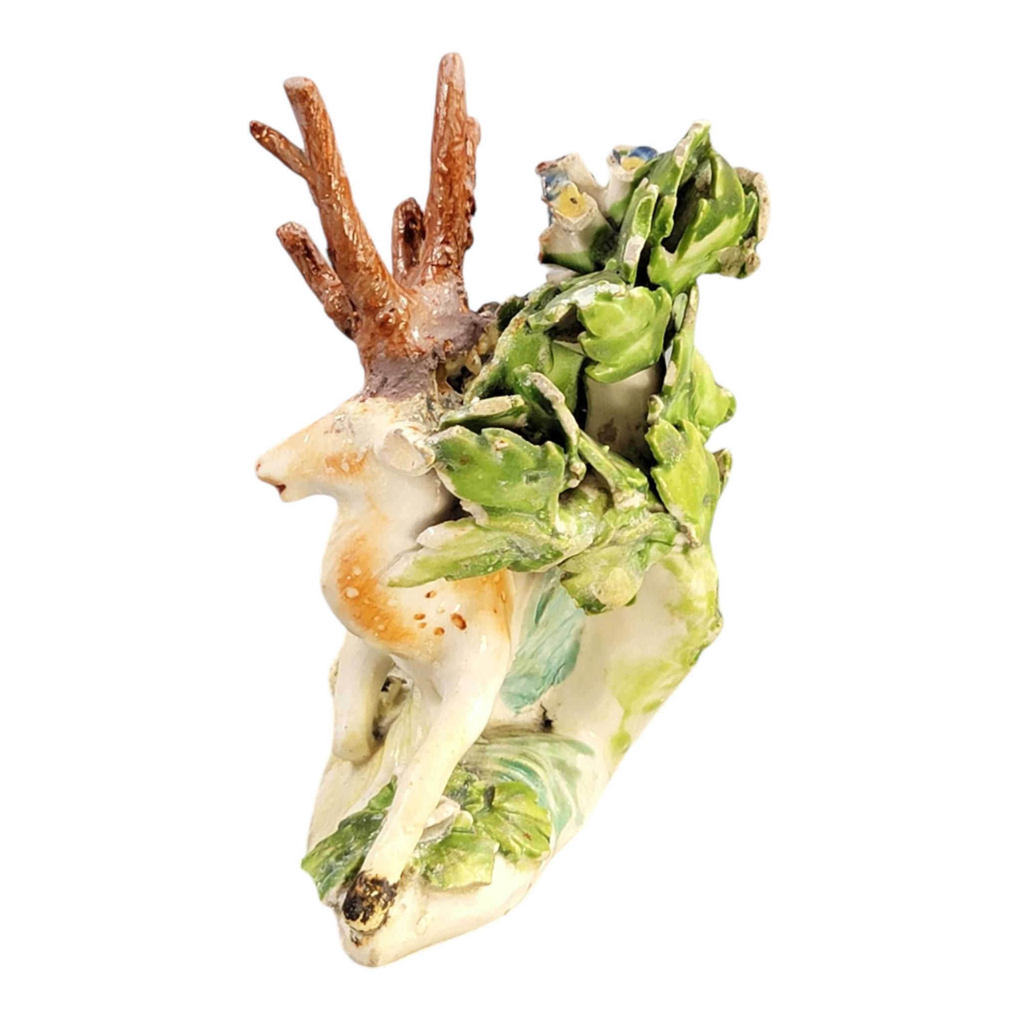 Early Derby porcelain recumbent stag figure Patch Period c.1760