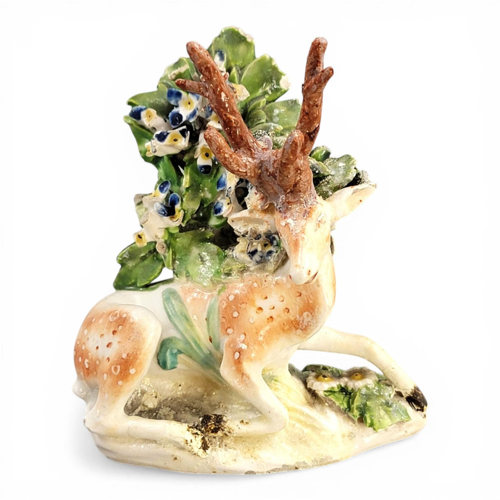 Early Derby porcelain recumbent stag figure Patch Period c.1760