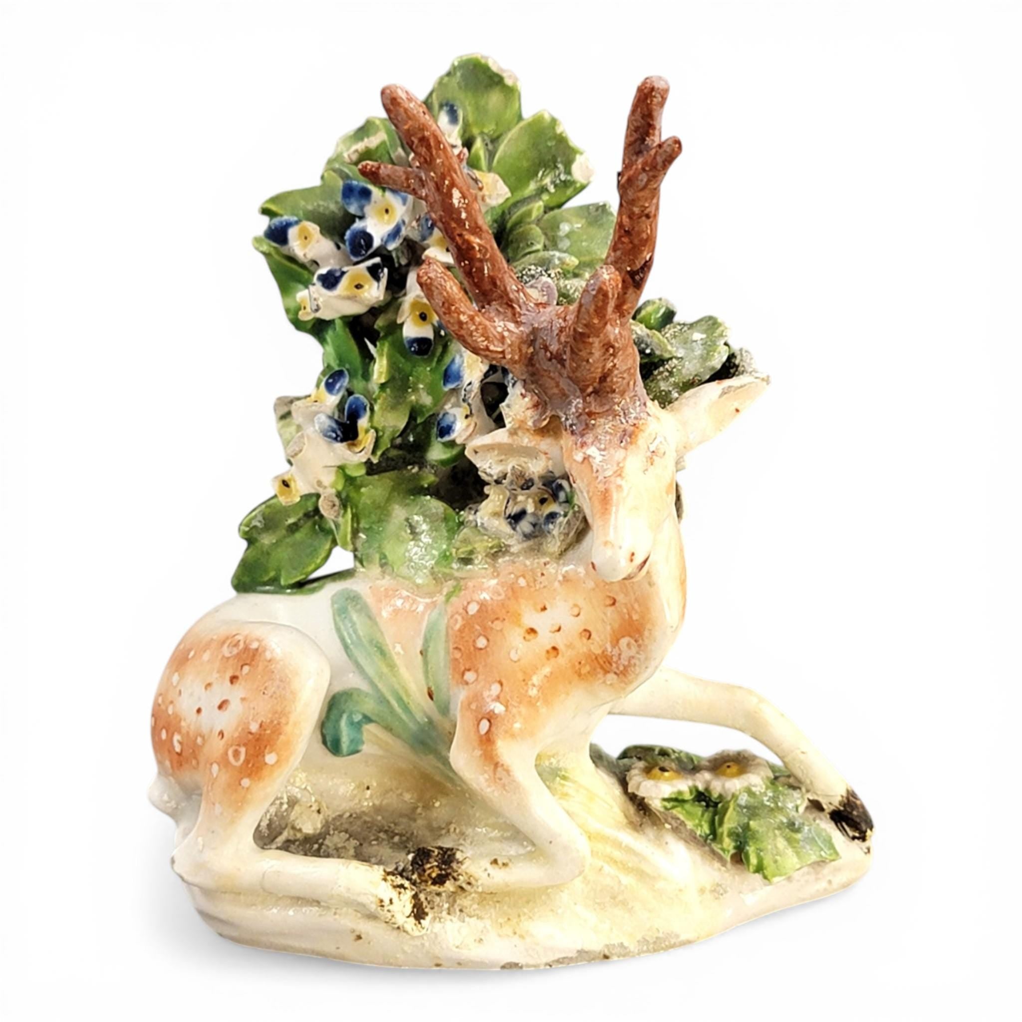 Early Derby porcelain recumbent stag figure Patch Period c.1760