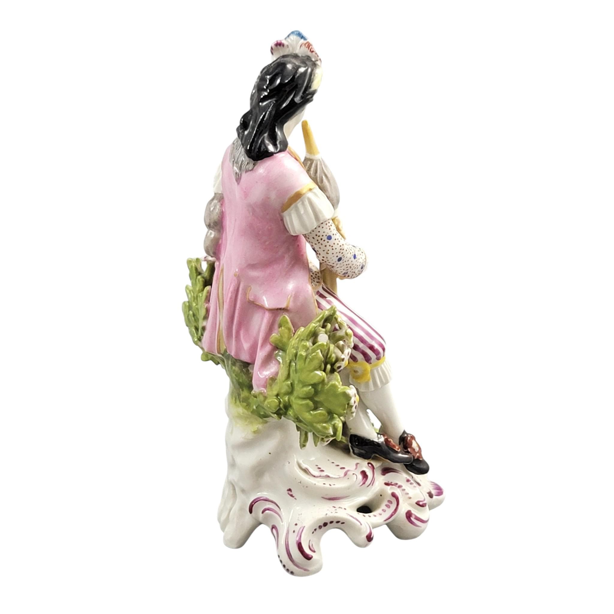 Rare Derby porcelain figure seated bagpiper dog, model 301, c. 1760