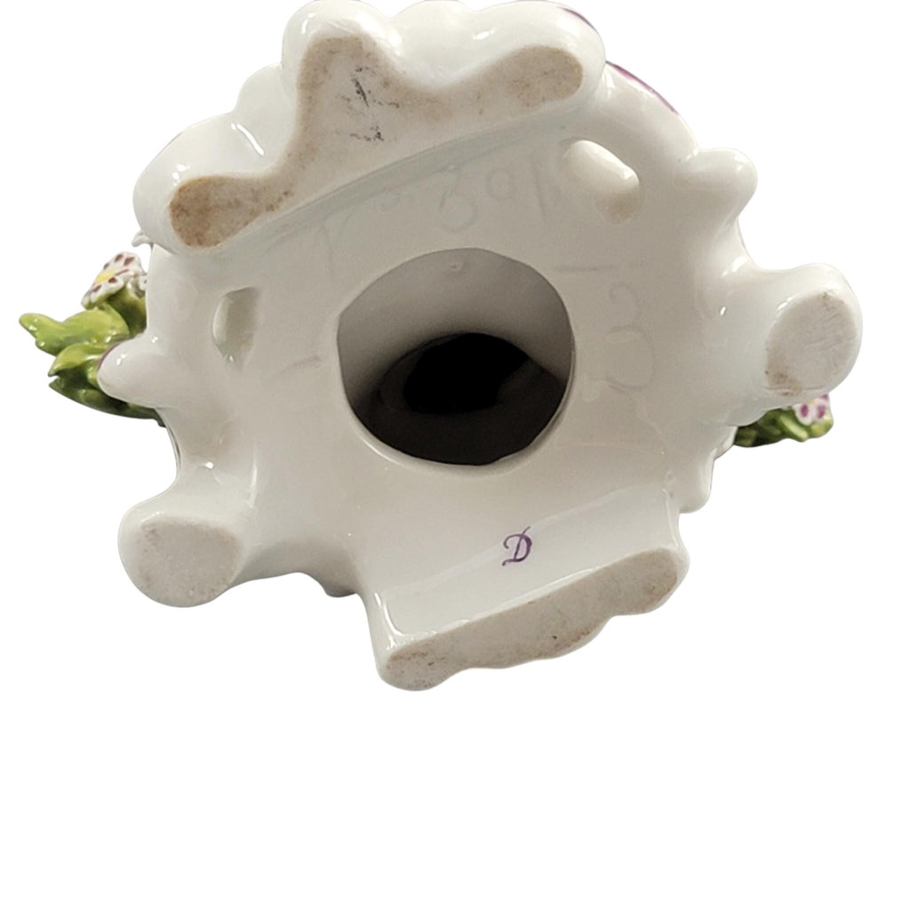 Rare Derby porcelain figure seated bagpiper dog, model 301, c. 1760