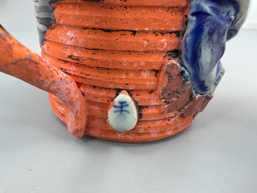 Japanese Sumida Gawa Mug with Applied Karako Figure, Signed Kōko — Meiji / Early Taishō Period