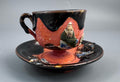 Japanese Sumida Gawa Cup and Saucer with Applied Sage Figures, Attributed to Ishiguro Kōko — Meiji / Early Taishō Period