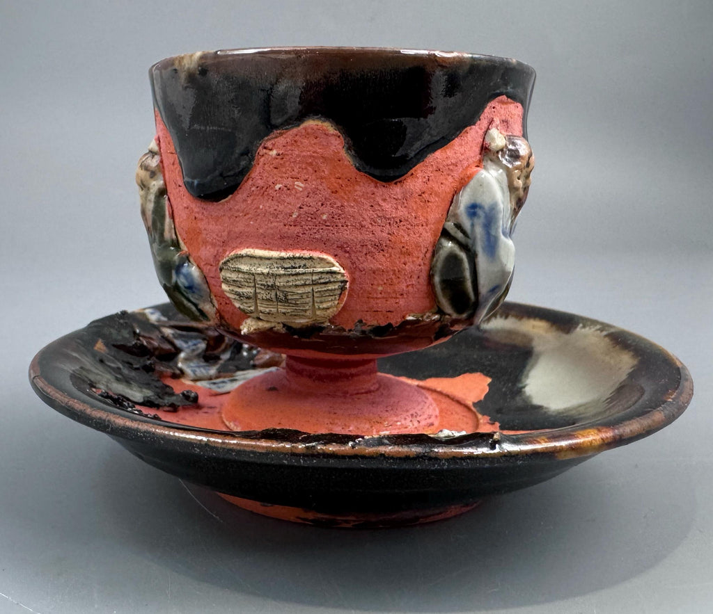 Japanese Sumida Gawa Cup and Saucer with Applied Sage Figures, Attributed to Ishiguro Kōko — Meiji / Early Taishō Period