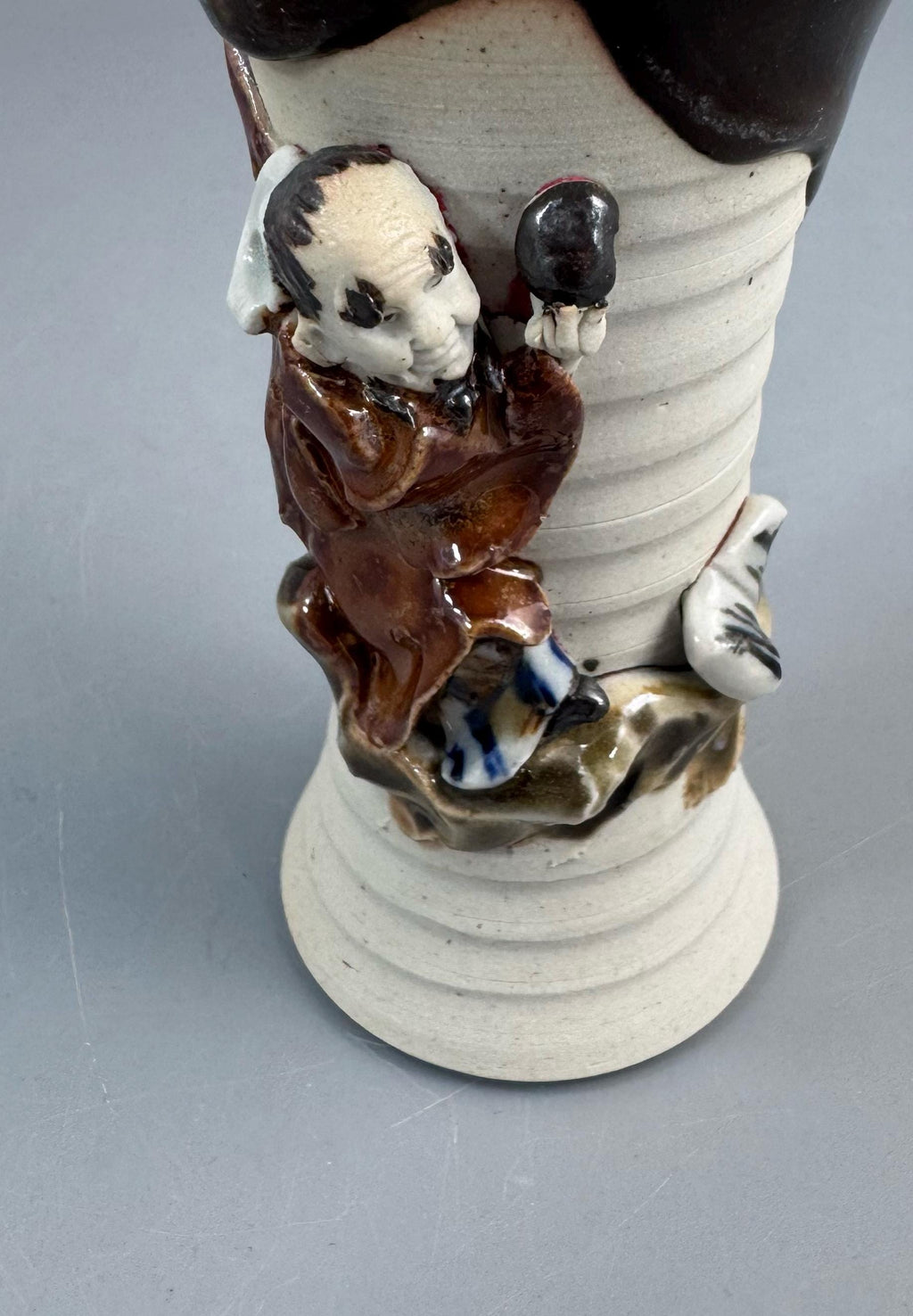 Sumida Gawa Stoneware Vase with Applied Rakan Figure, Signed Ryōsai, Meiji–Taishō Period