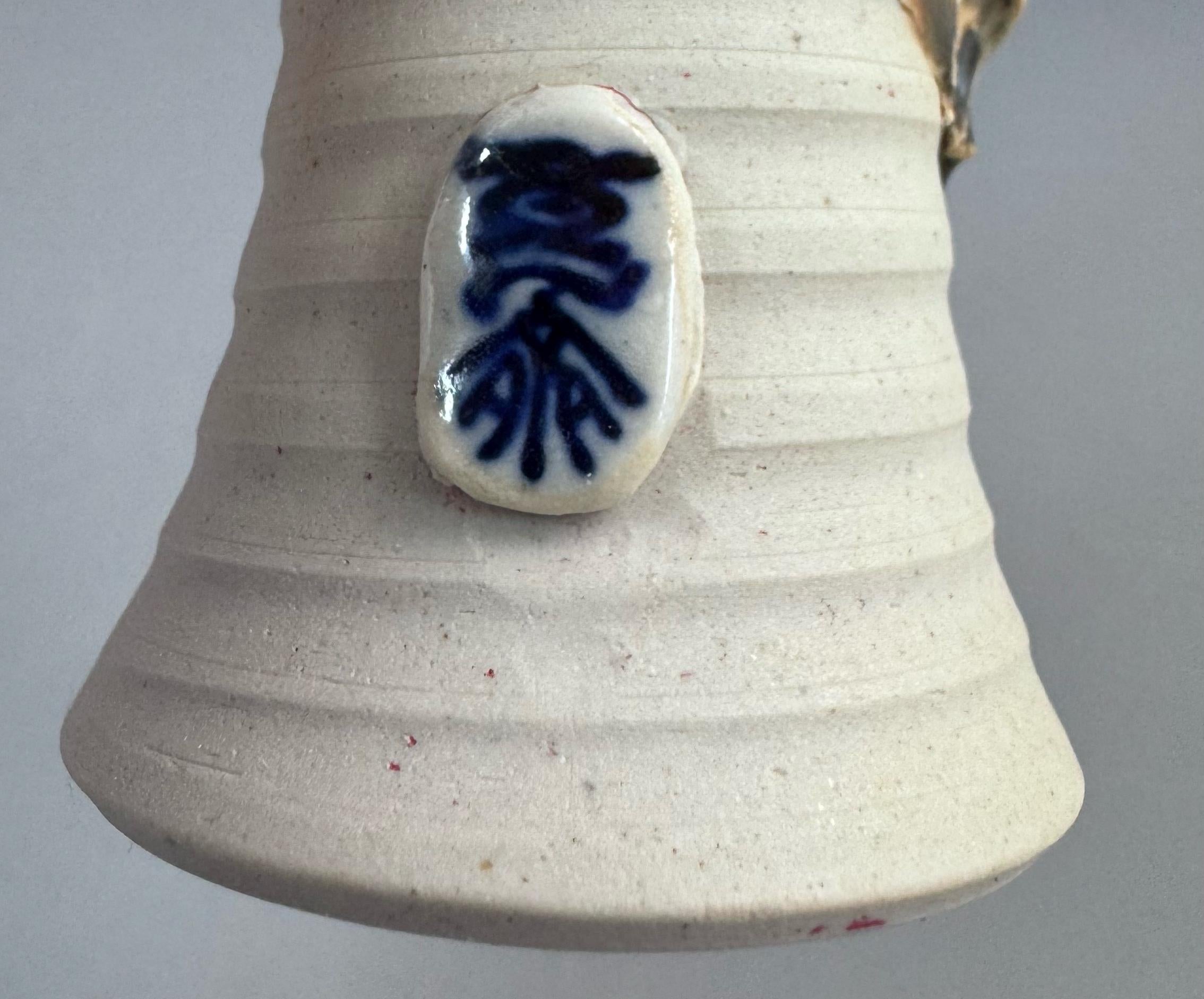 Sumida Gawa Stoneware Vase with Applied Rakan Figure, Signed Ryōsai, Meiji–Taishō Period