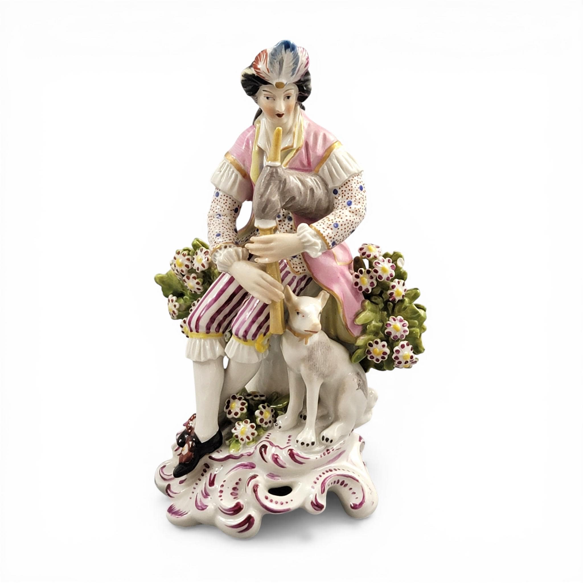 Rare Derby porcelain figure seated bagpiper dog, model 301, c. 1760