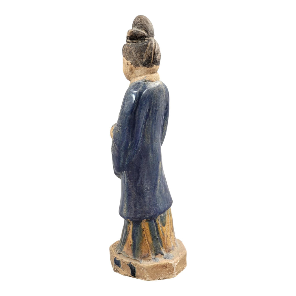 Chinese Tang sancai glazed funerary figure, court attendant, c. 7th–8th