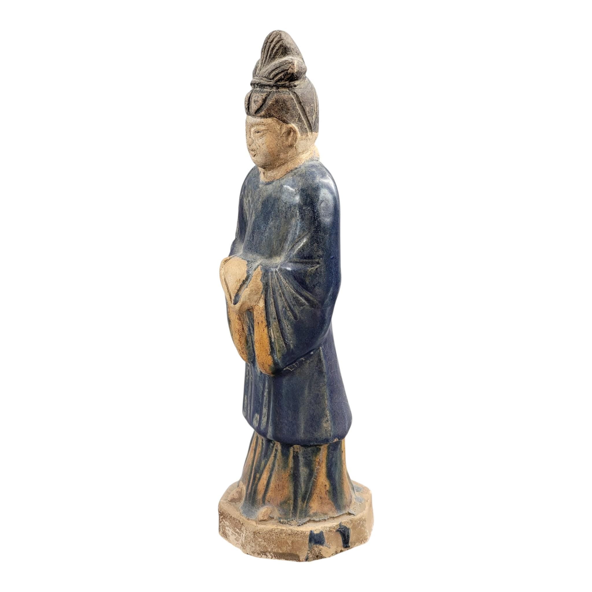Chinese Tang sancai glazed funerary figure, court attendant, c. 7th–8th
