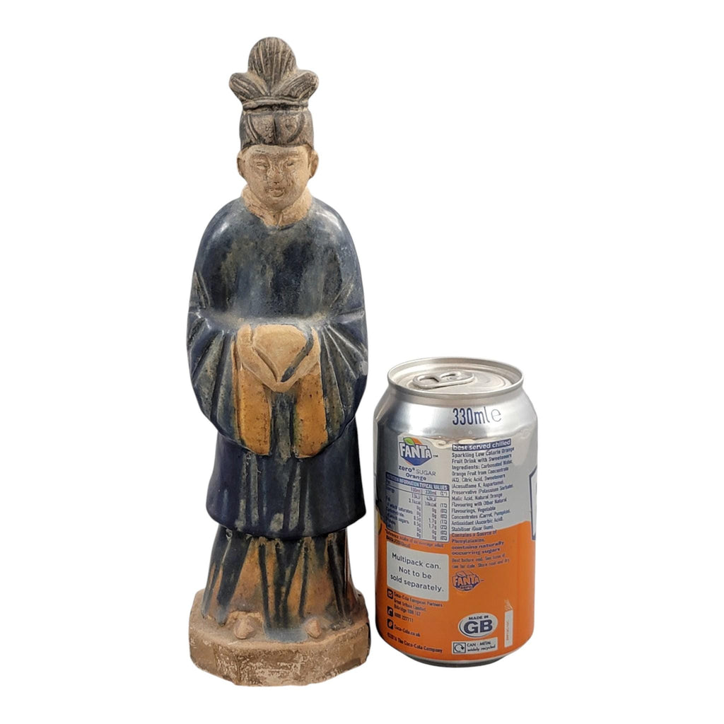 Chinese Tang sancai glazed funerary figure, court attendant, c. 7th–8th