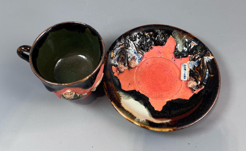 Japanese Sumida Gawa Cup and Saucer with Applied Sage Figures, Attributed to Ishiguro Kōko — Meiji / Early Taishō Period