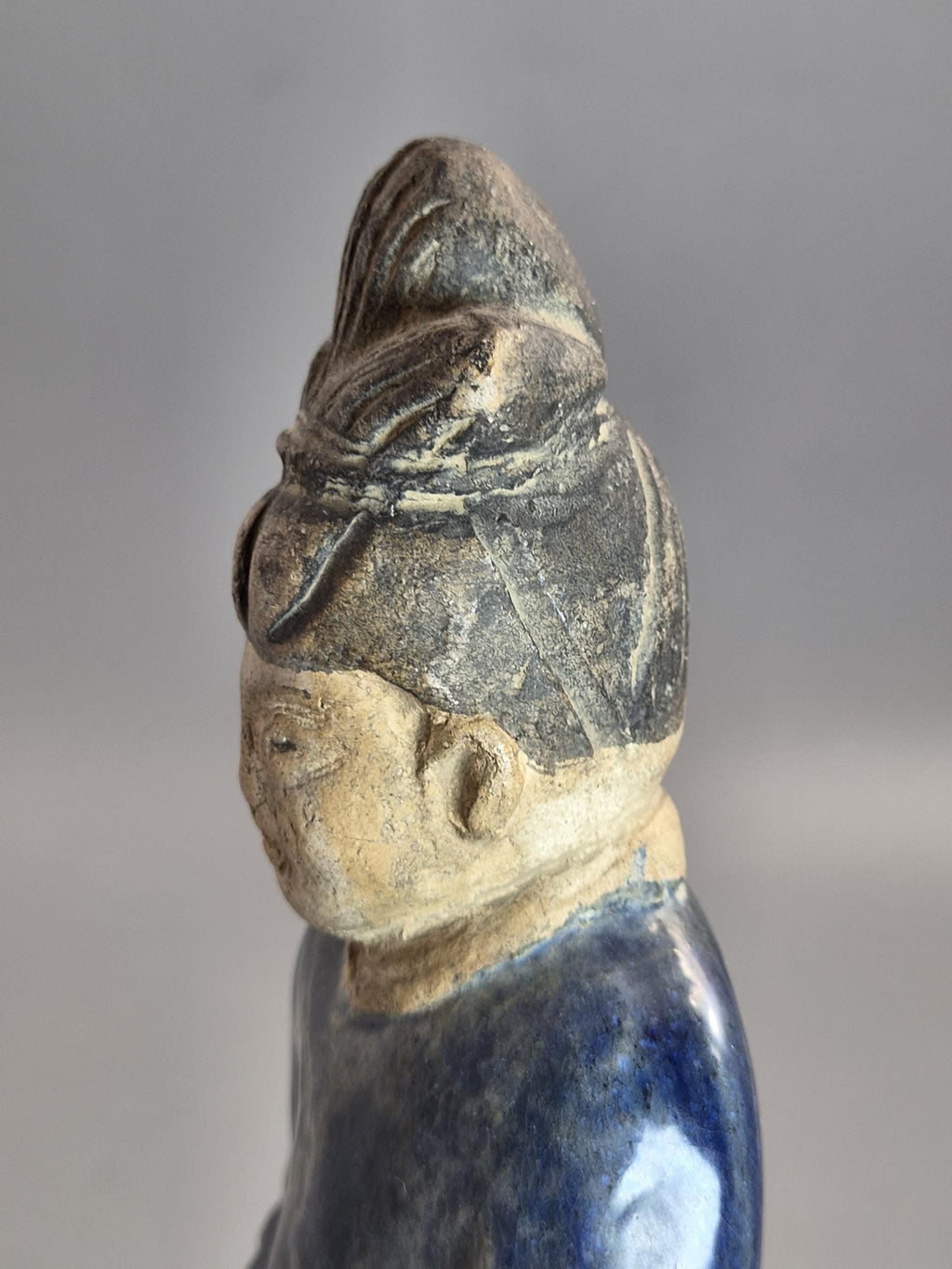 Chinese Tang sancai glazed funerary figure, court attendant, c. 7th–8th