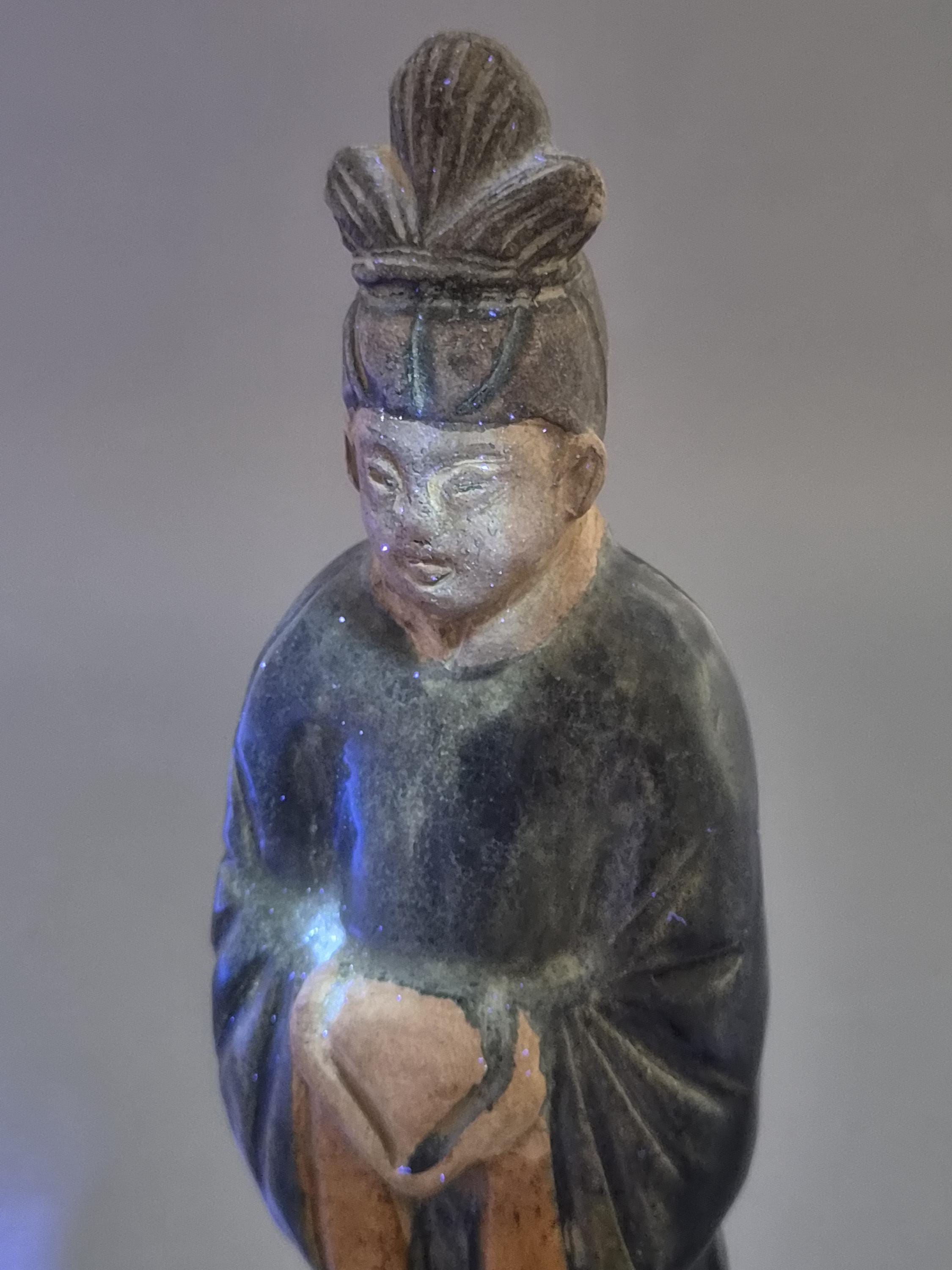 Chinese Tang sancai glazed funerary figure, court attendant, c. 7th–8th