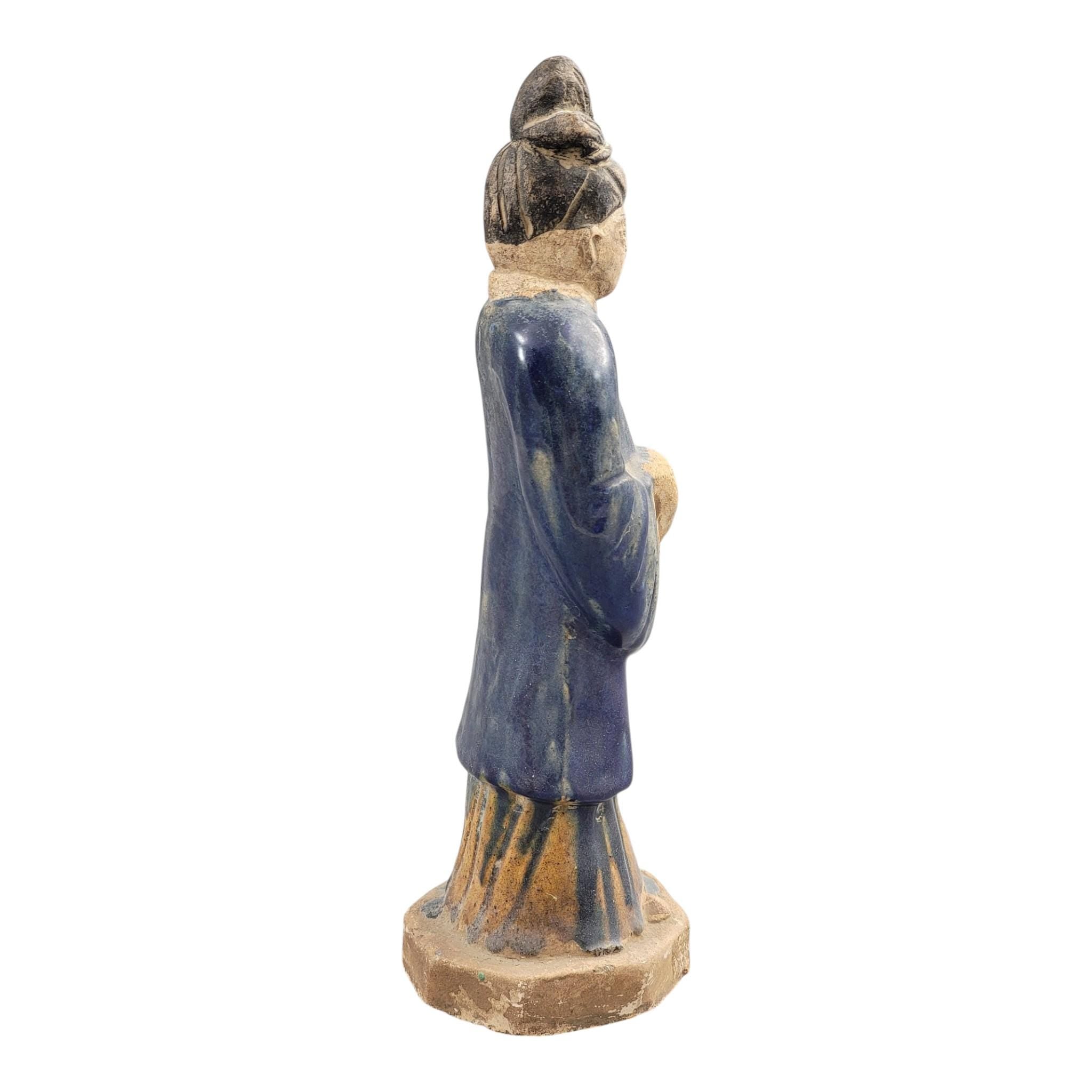 Chinese Tang sancai glazed funerary figure, court attendant, c. 7th–8th
