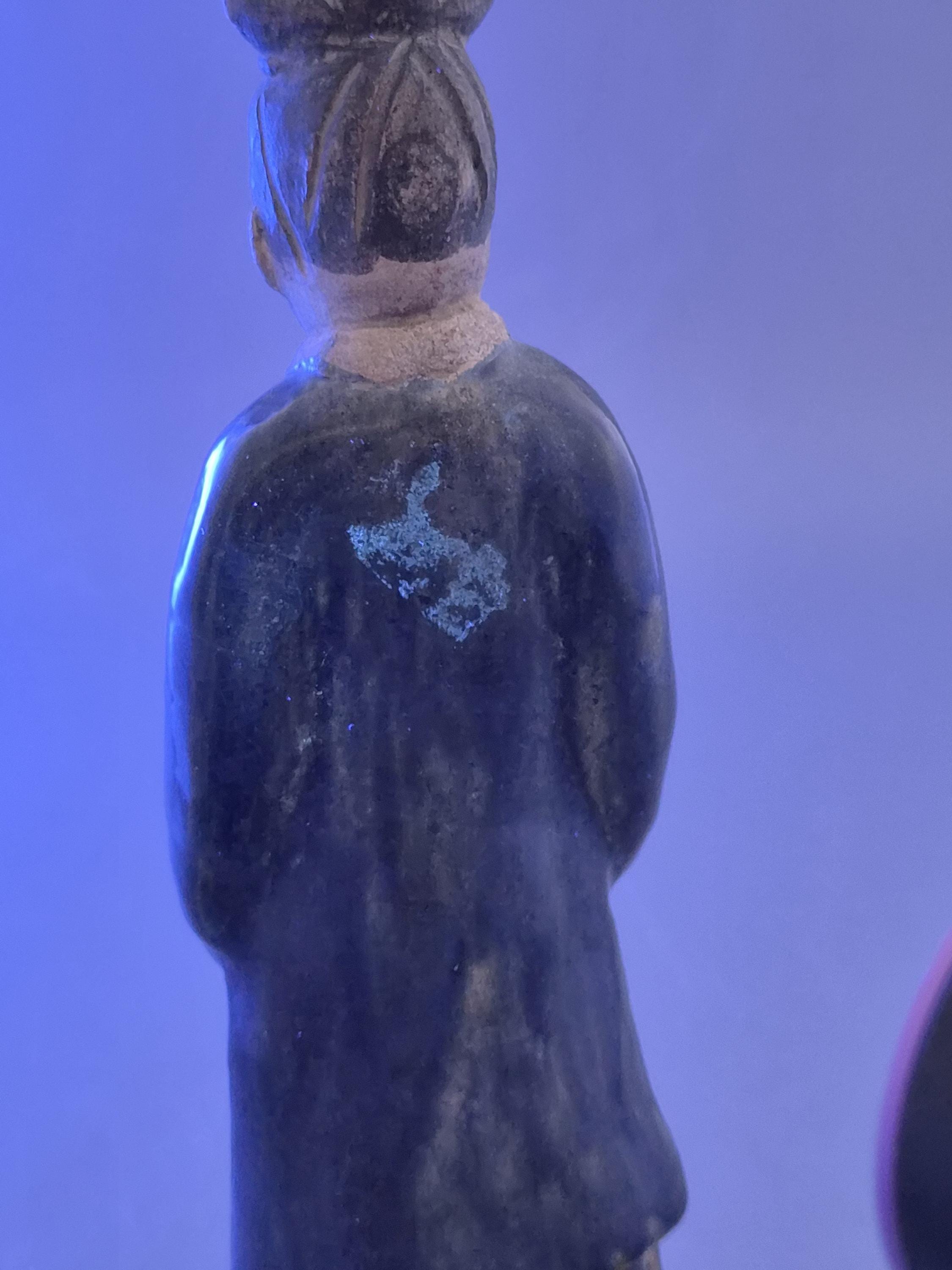Chinese Tang sancai glazed funerary figure, court attendant, c. 7th–8th