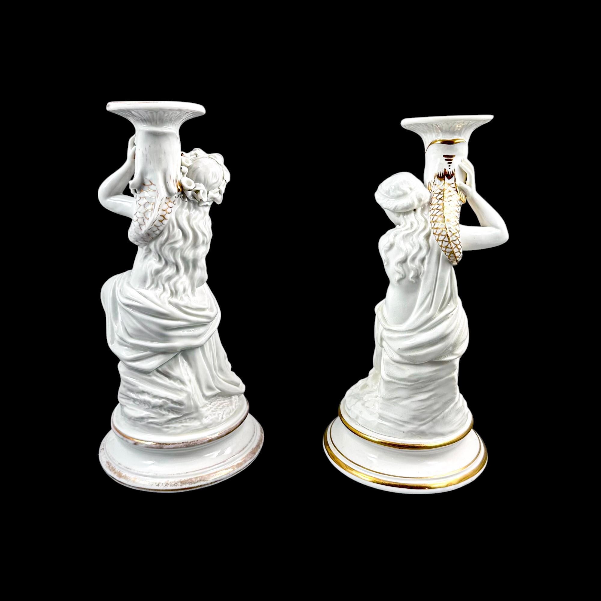 Pair of Victorian English porcelain figural candlesticks, Sutherland & Sons style, Neoclassical ladies with dolphin, antique Staffordshire