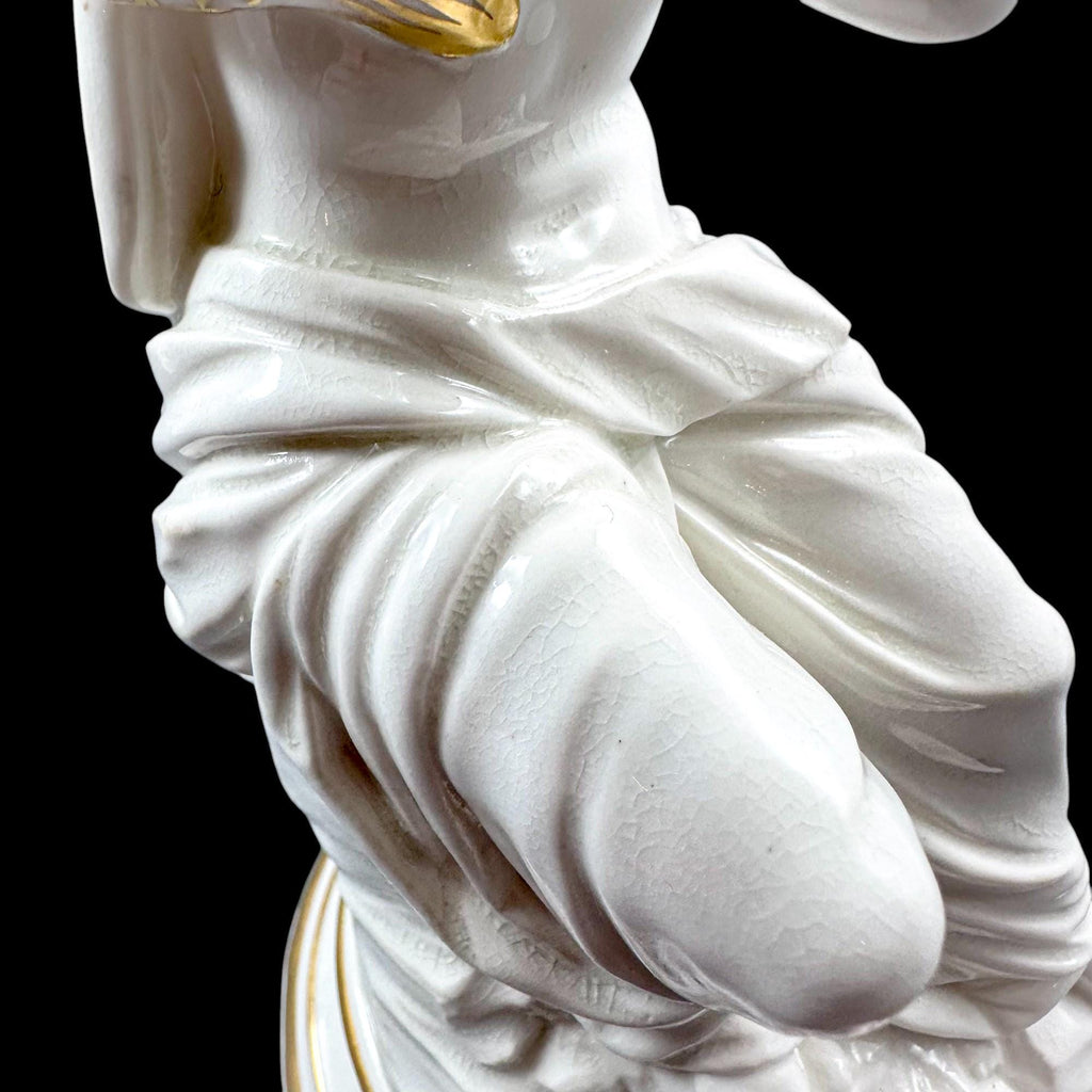 Pair of Victorian English porcelain figural candlesticks, Sutherland & Sons style, Neoclassical ladies with dolphin, antique Staffordshire