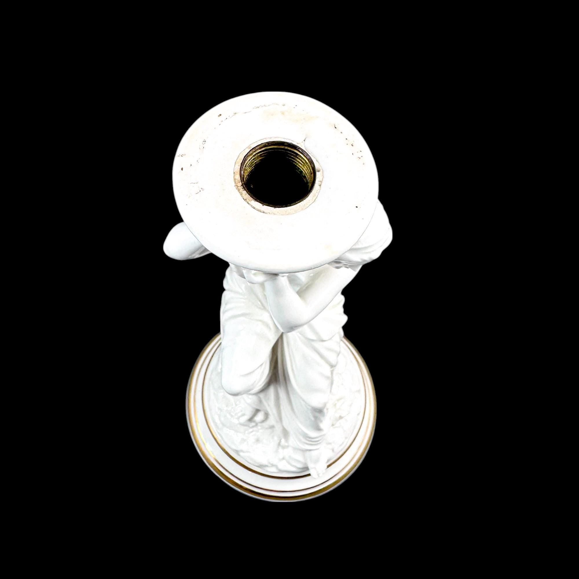 Pair of Victorian English porcelain figural candlesticks, Sutherland & Sons style, Neoclassical ladies with dolphin, antique Staffordshire