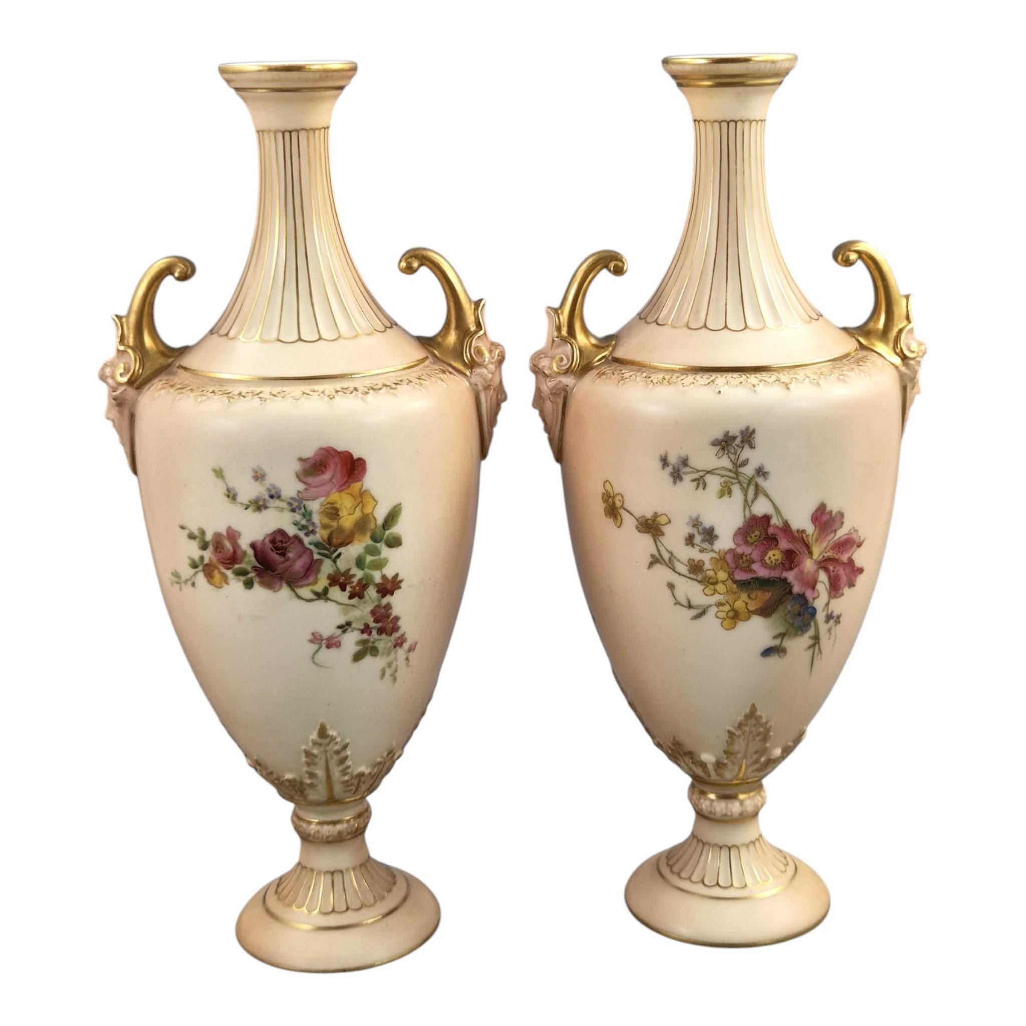 Royal Worcester blush ivory floral vase pair with faun mask handles, 1900