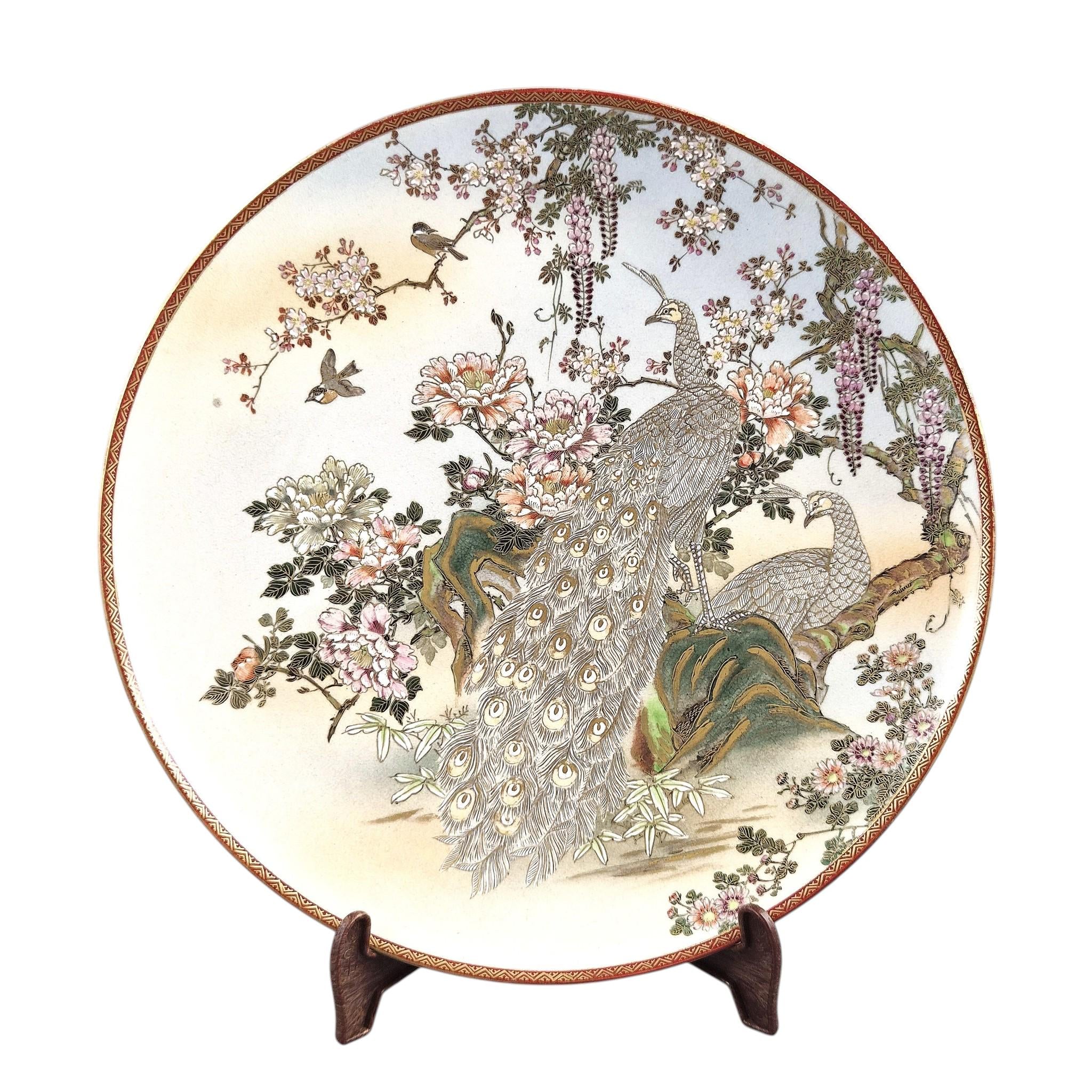 Large Meiji Japanese Satsuma Moriage charger with peacocks, wisteria and peonies, 31 cm export ware c.1890–1915