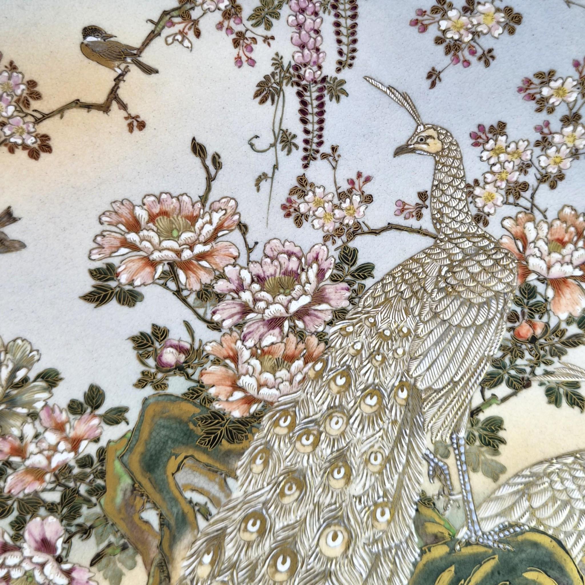Large Meiji Japanese Satsuma Moriage charger with peacocks, wisteria and peonies, 31 cm export ware c.1890–1915