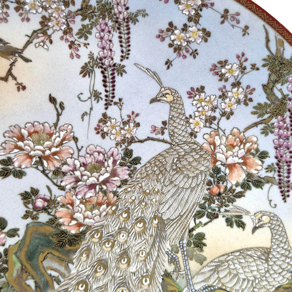 Large Meiji Japanese Satsuma Moriage charger with peacocks, wisteria and peonies, 31 cm export ware c.1890–1915