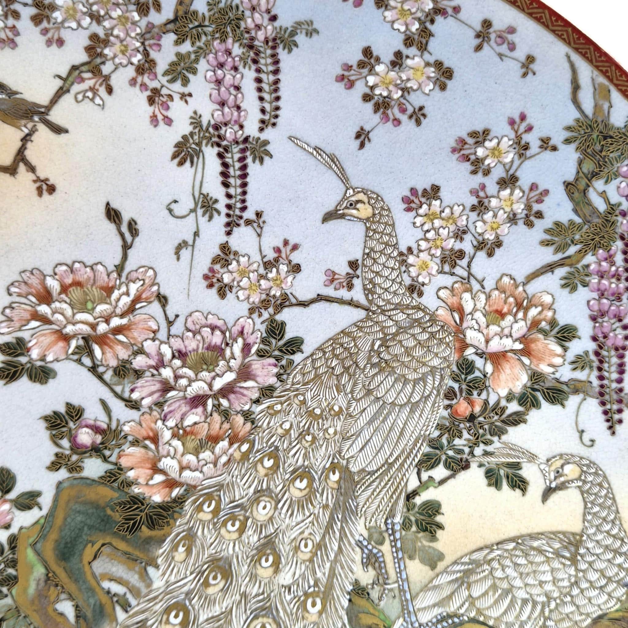 Large Meiji Japanese Satsuma Moriage charger with peacocks, wisteria and peonies, 31 cm export ware c.1890–1915