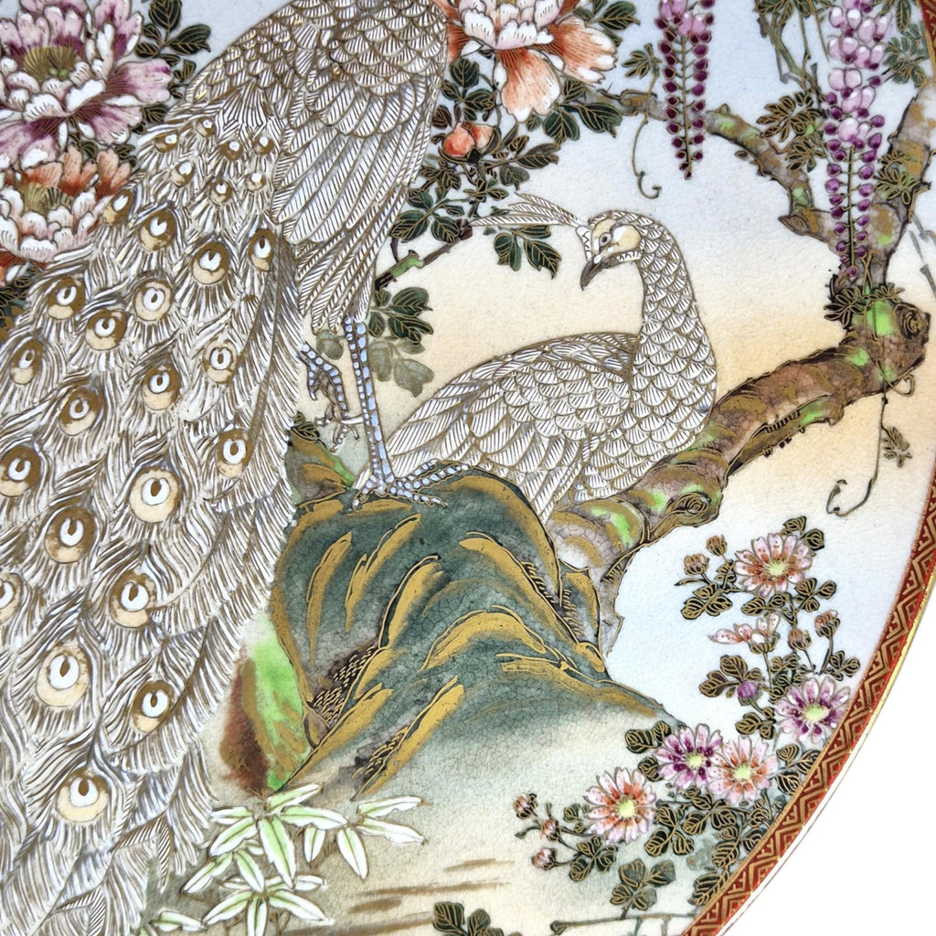 Large Meiji Japanese Satsuma Moriage charger with peacocks, wisteria and peonies, 31 cm export ware c.1890–1915