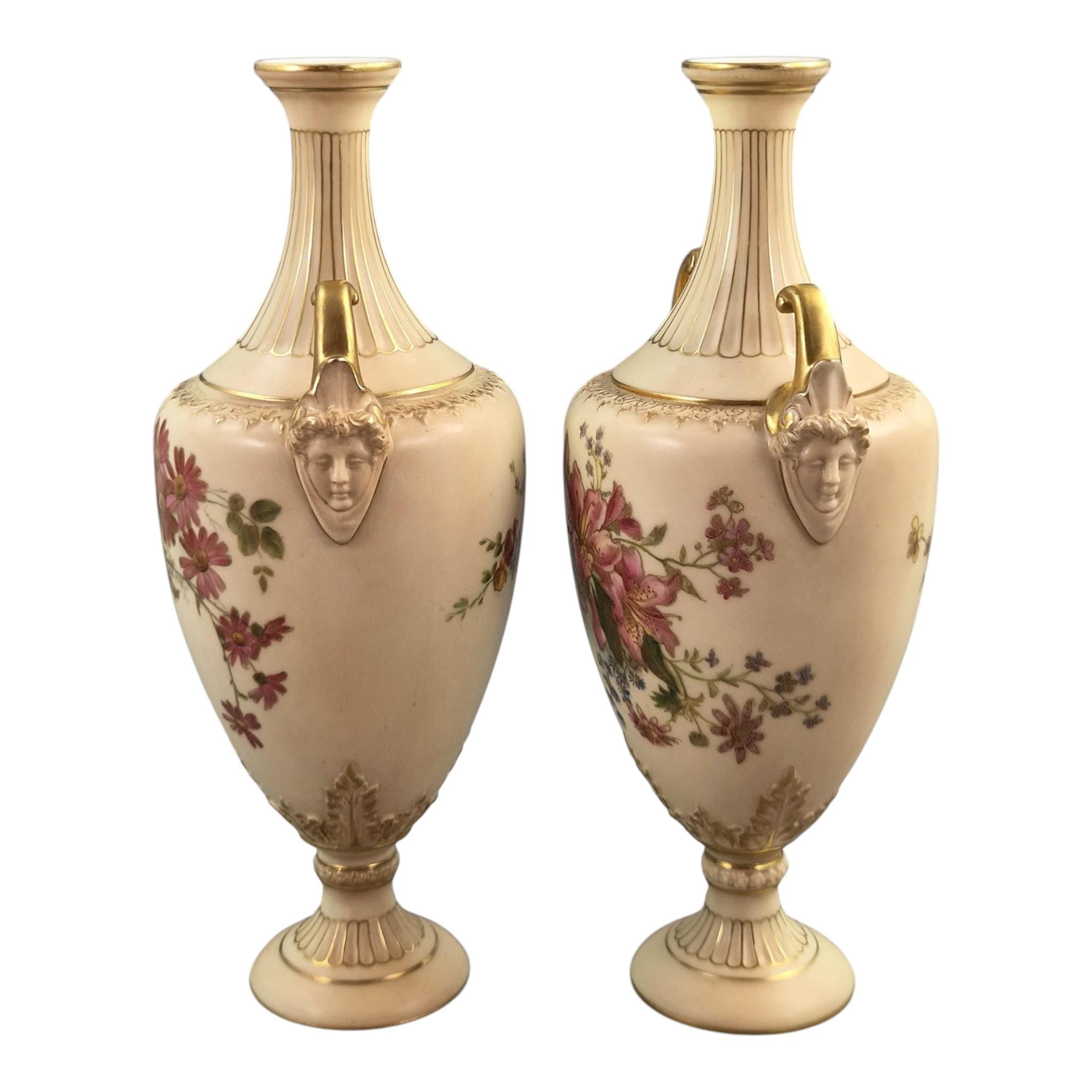Royal Worcester blush ivory floral vase pair with faun mask handles, 1900