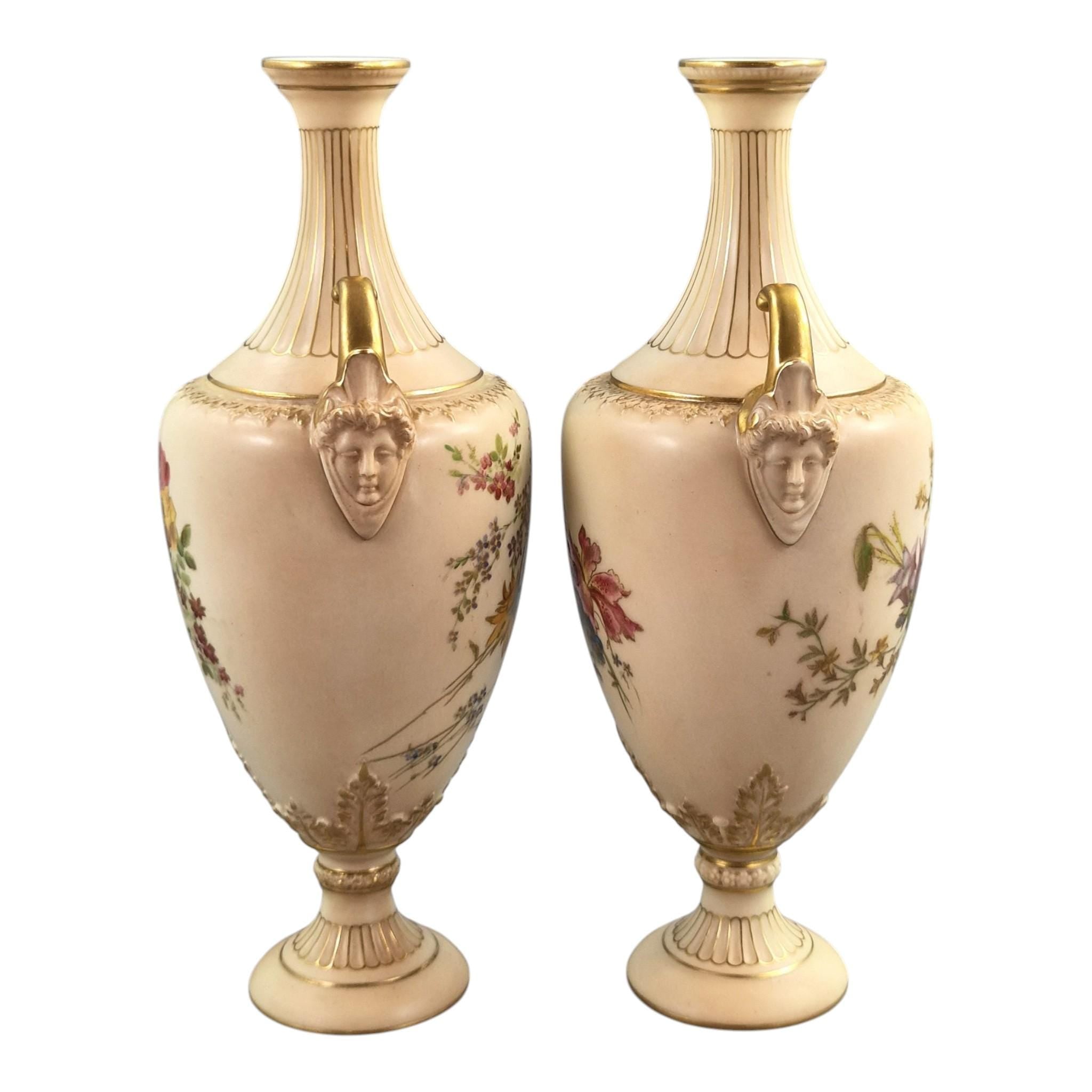 Royal Worcester blush ivory floral vase pair with faun mask handles, 1900