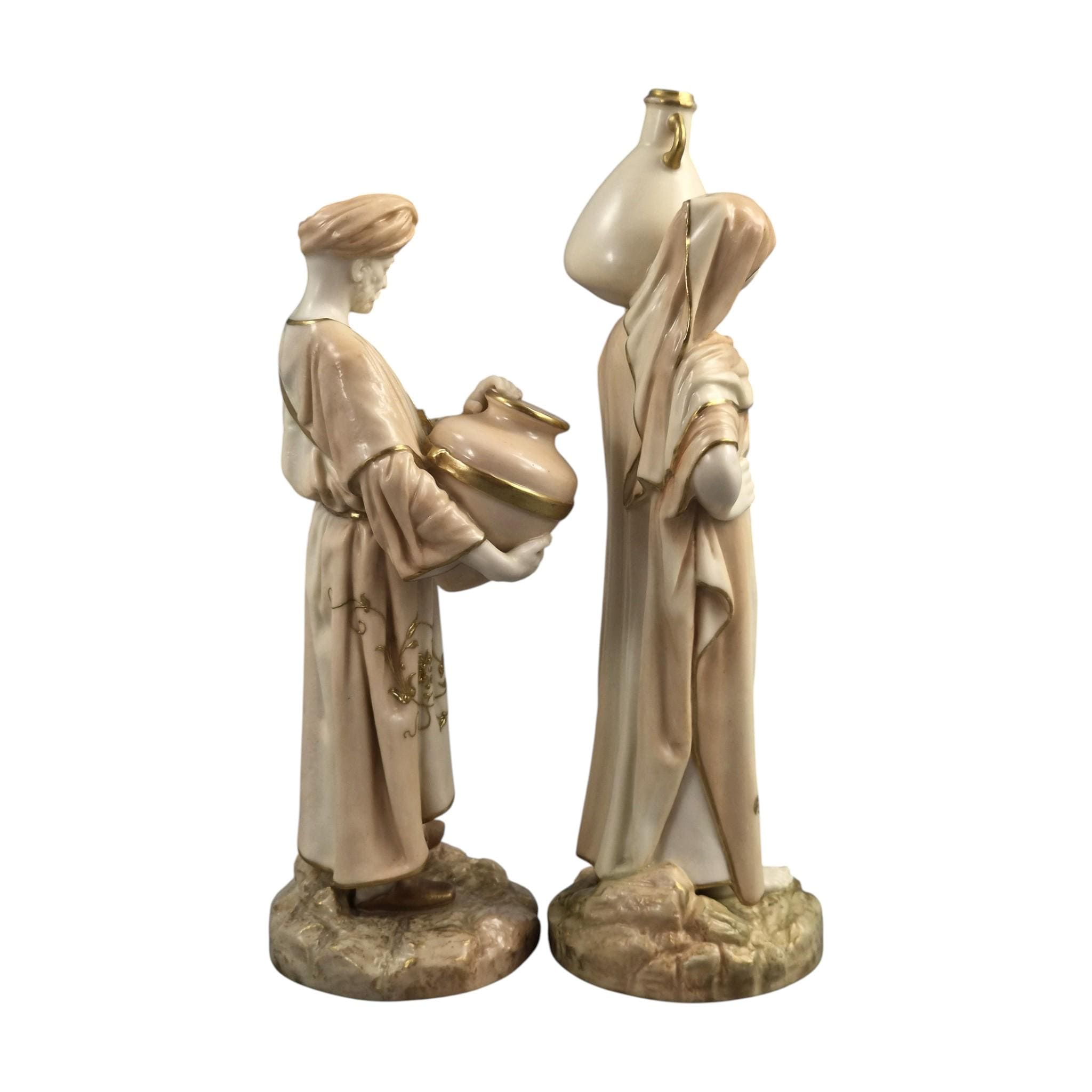 Royal Worcester Blush Ivory Cairo Water Carriers by James Hadley, Pair of Orientalist Porcelain Figures, 1901-1902