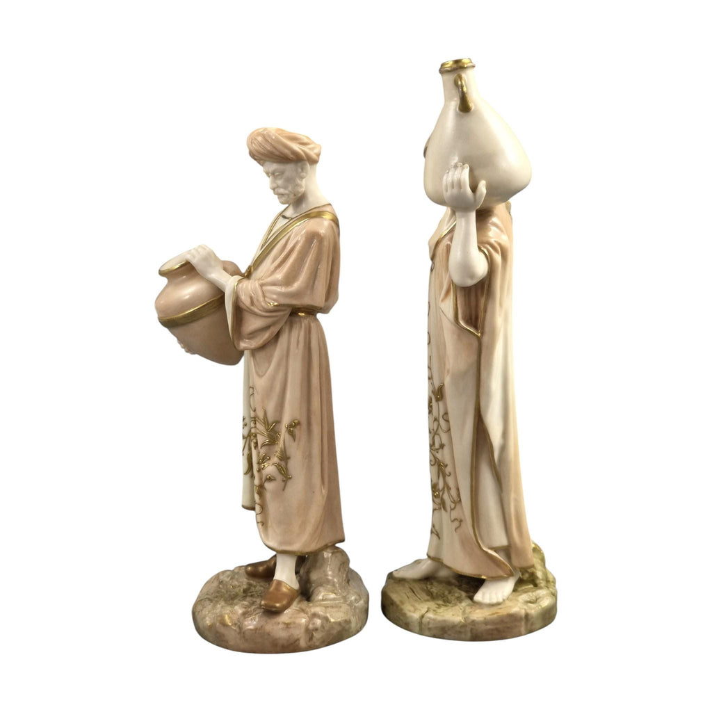 Royal Worcester Blush Ivory Cairo Water Carriers by James Hadley, Pair of Orientalist Porcelain Figures, 1901-1902