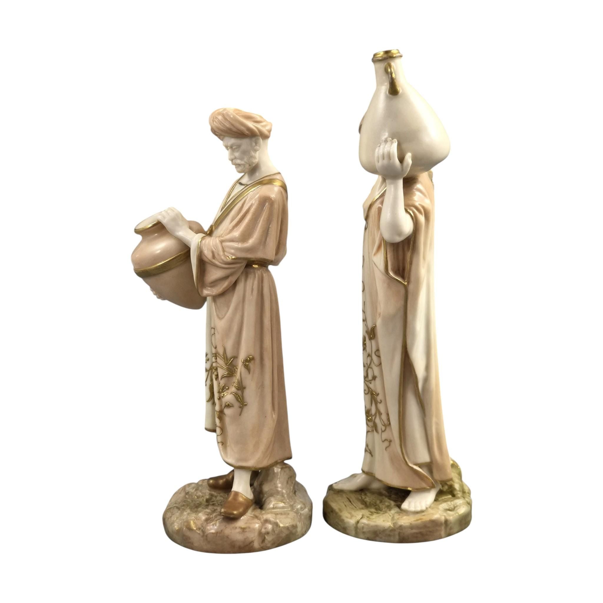 Royal Worcester Blush Ivory Cairo Water Carriers by James Hadley, Pair of Orientalist Porcelain Figures, 1901-1902