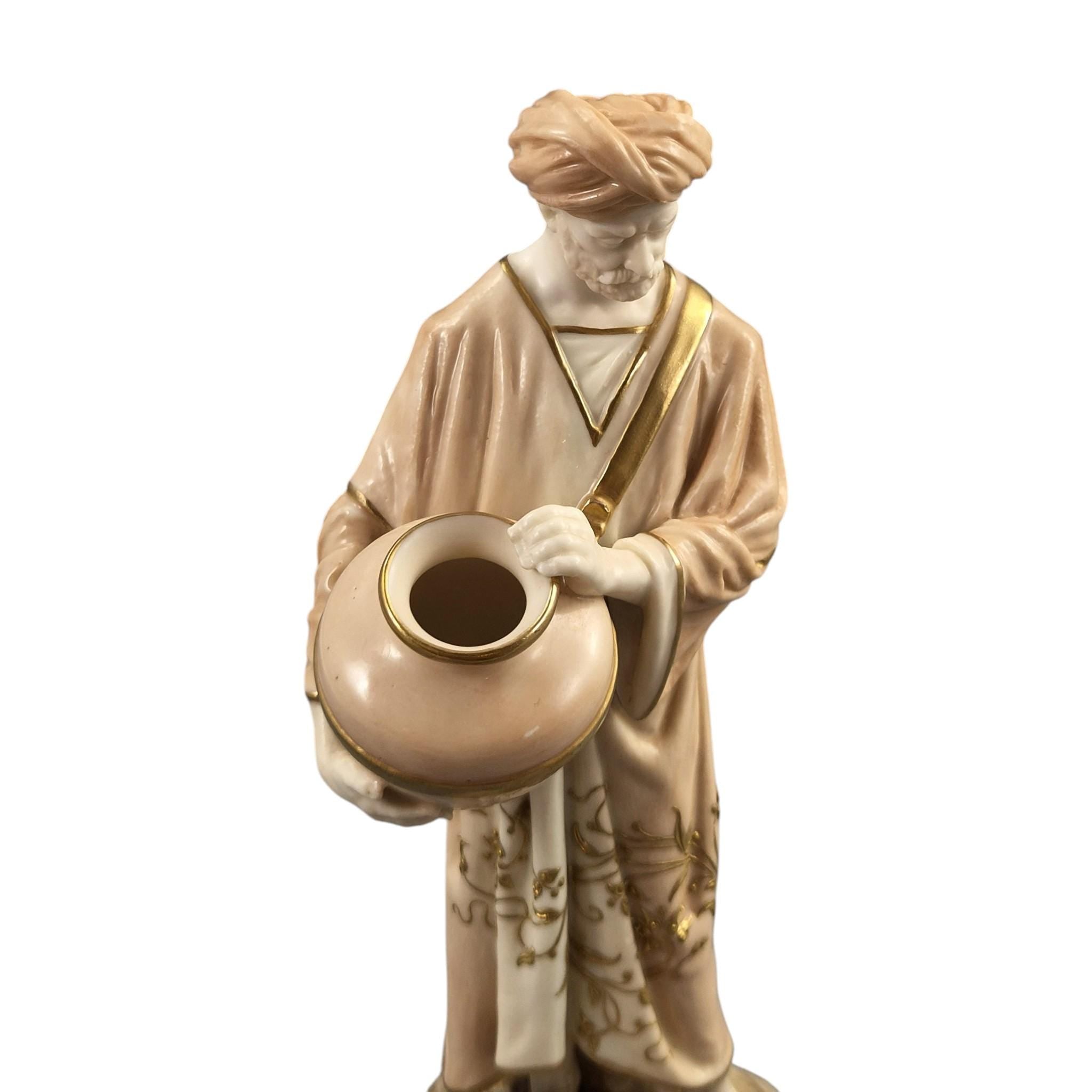 Royal Worcester Blush Ivory Cairo Water Carriers by James Hadley, Pair of Orientalist Porcelain Figures, 1901-1902