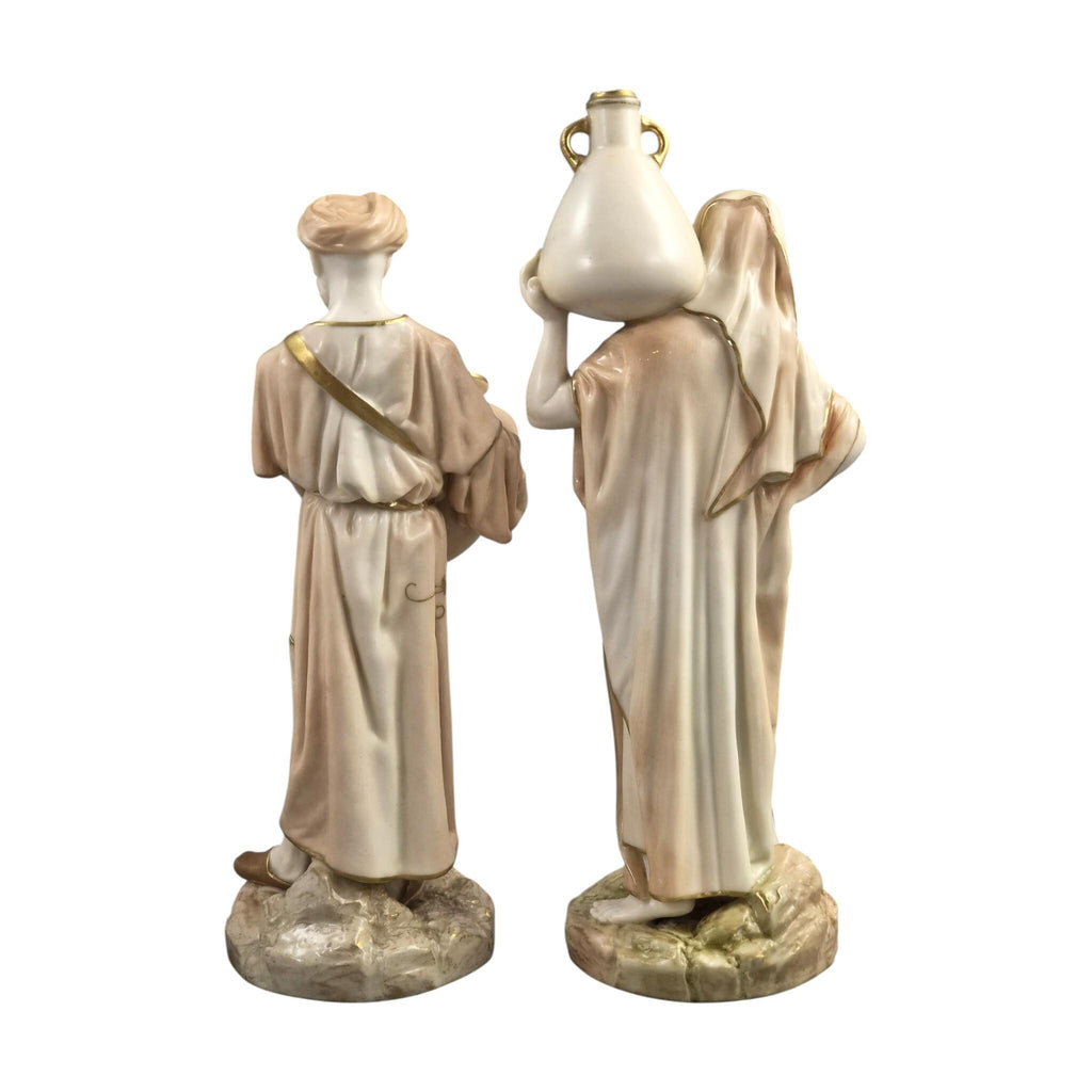 Royal Worcester Blush Ivory Cairo Water Carriers by James Hadley, Pair of Orientalist Porcelain Figures, 1901-1902